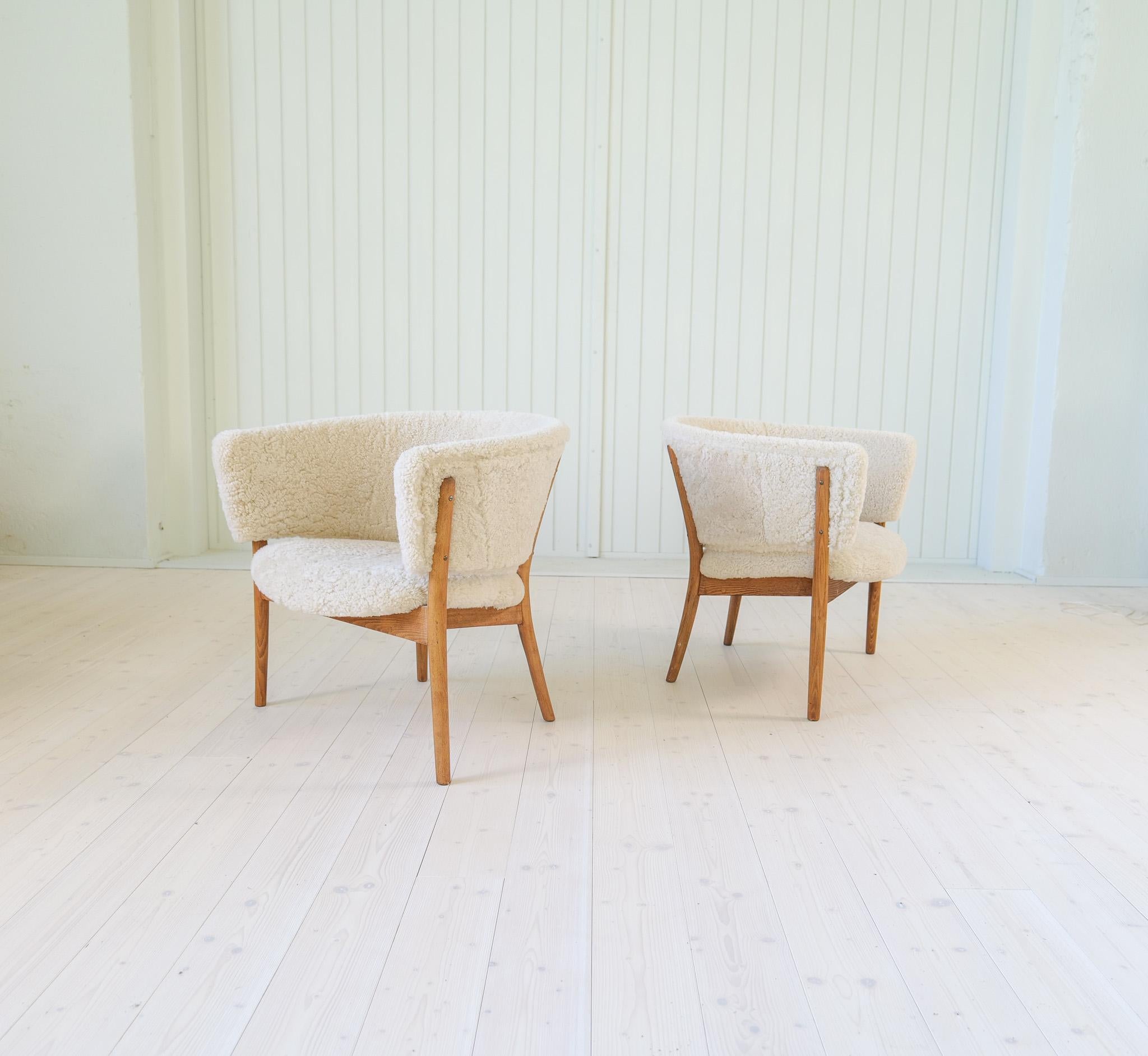 Mid-Century Modern Mid-Century Lounge Chairs in Sheepskin/Shearling and Stained Wood, Sweden, 1962 For Sale