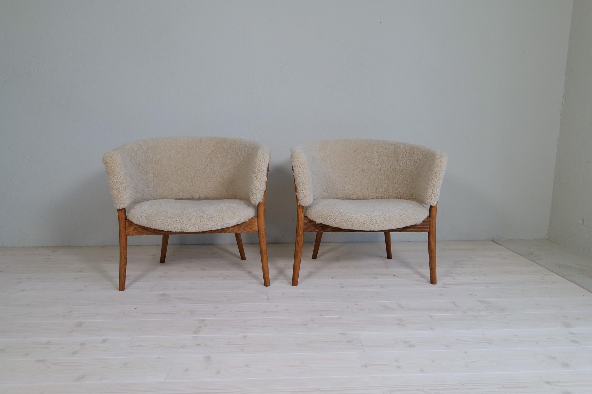 Swedish Mid-Century Lounge Charis in Sheepskin/Shearling and Stained Wood, Sweden, 1962 For Sale