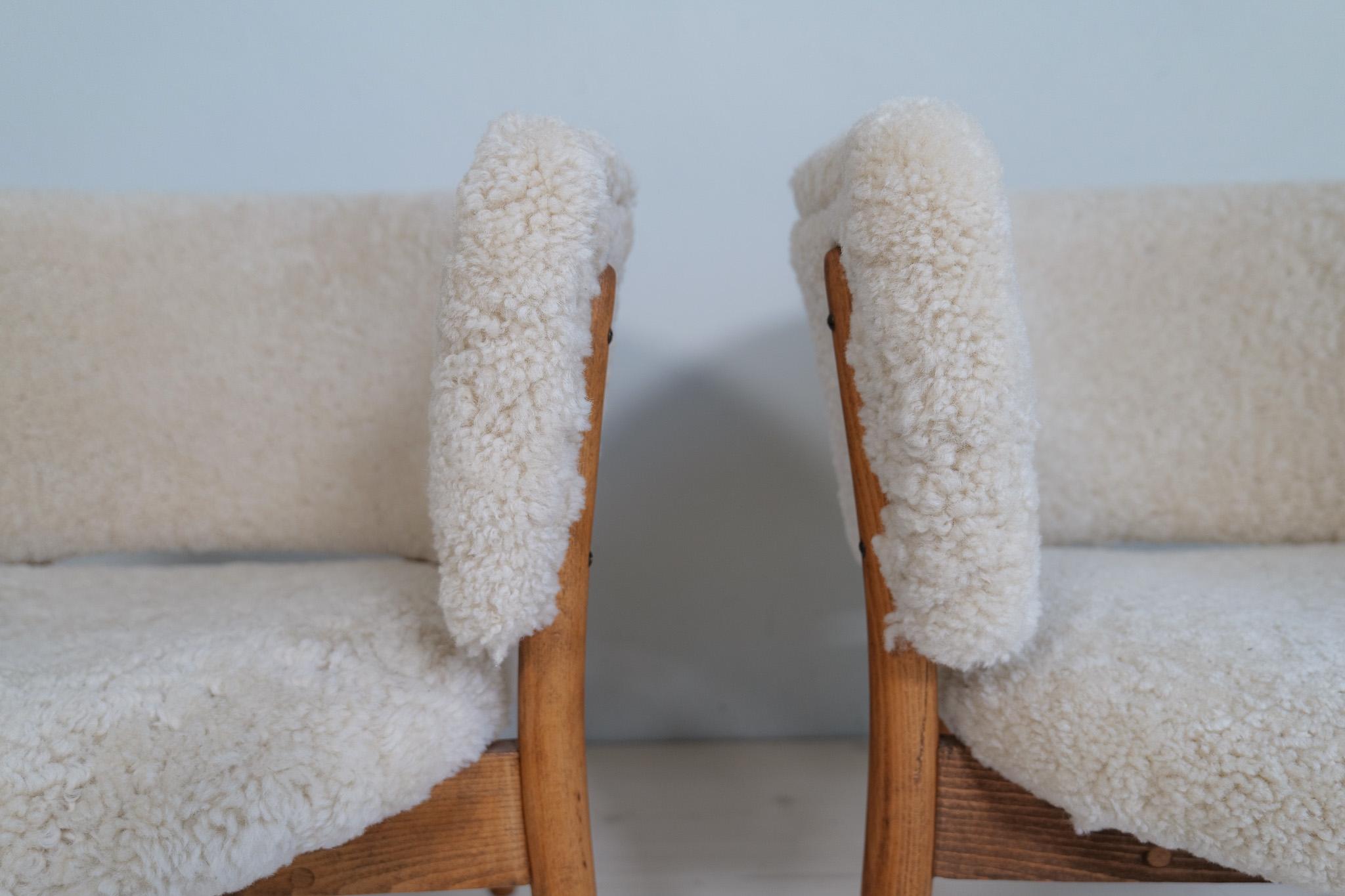 Mid-20th Century Mid-Century Lounge Charis in Sheepskin/Shearling and Stained Wood, Sweden, 1962 For Sale