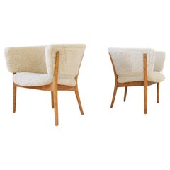 Vintage Mid-Century Lounge Charis in Sheepskin/Shearling and Stained Wood, Sweden, 1962
