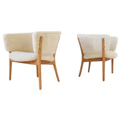 Mid-Century Lounge Chairs in Sheepskin/Shearling and Stained Wood, Sweden, 1962