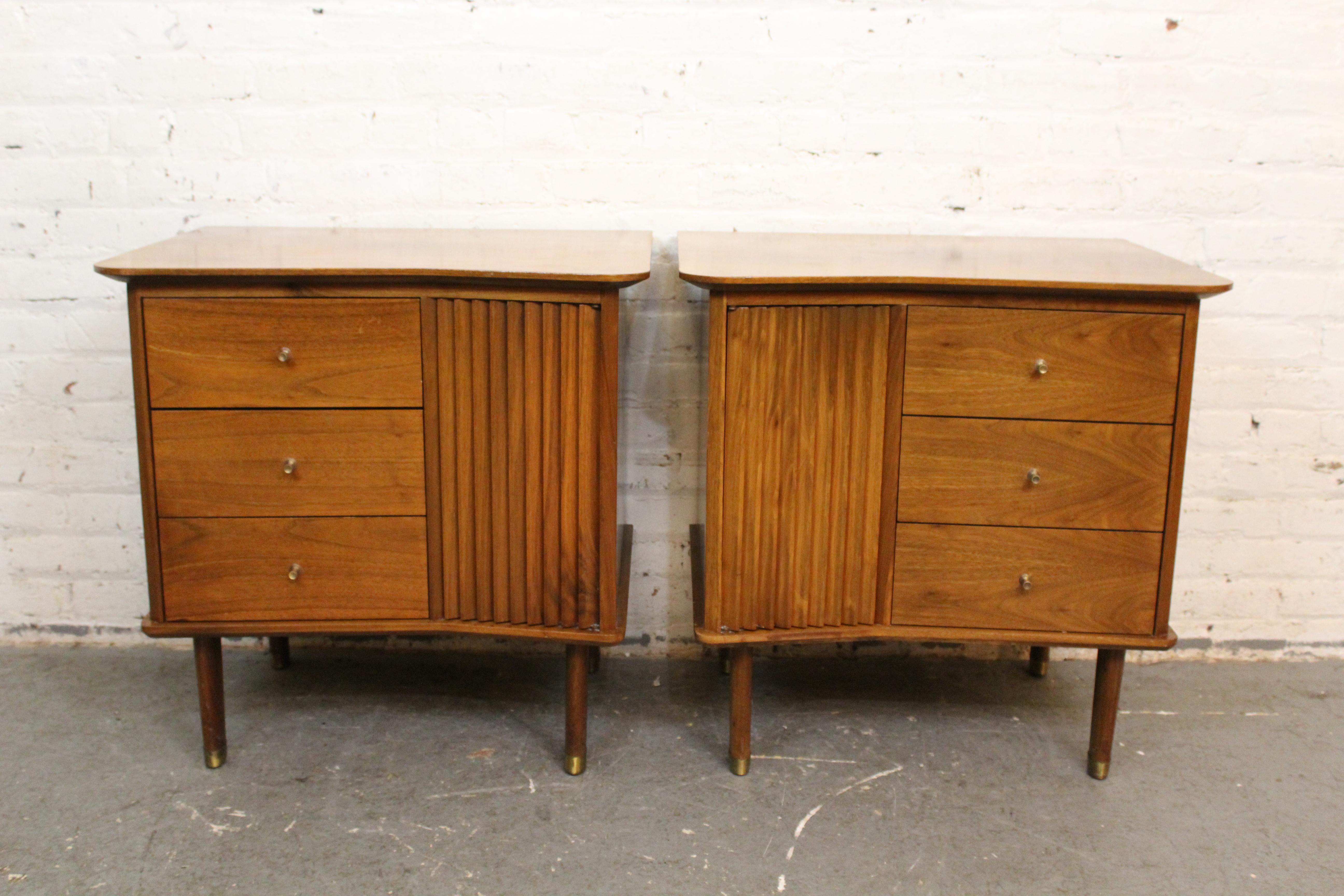 Add some funky '50s flair into any space with these mid-century vintage boomerang end tables from the master craftsmen of Lexington, North Carolina's United Furniture Corporation! This matched pair features complimentary asymmetrical tops, two