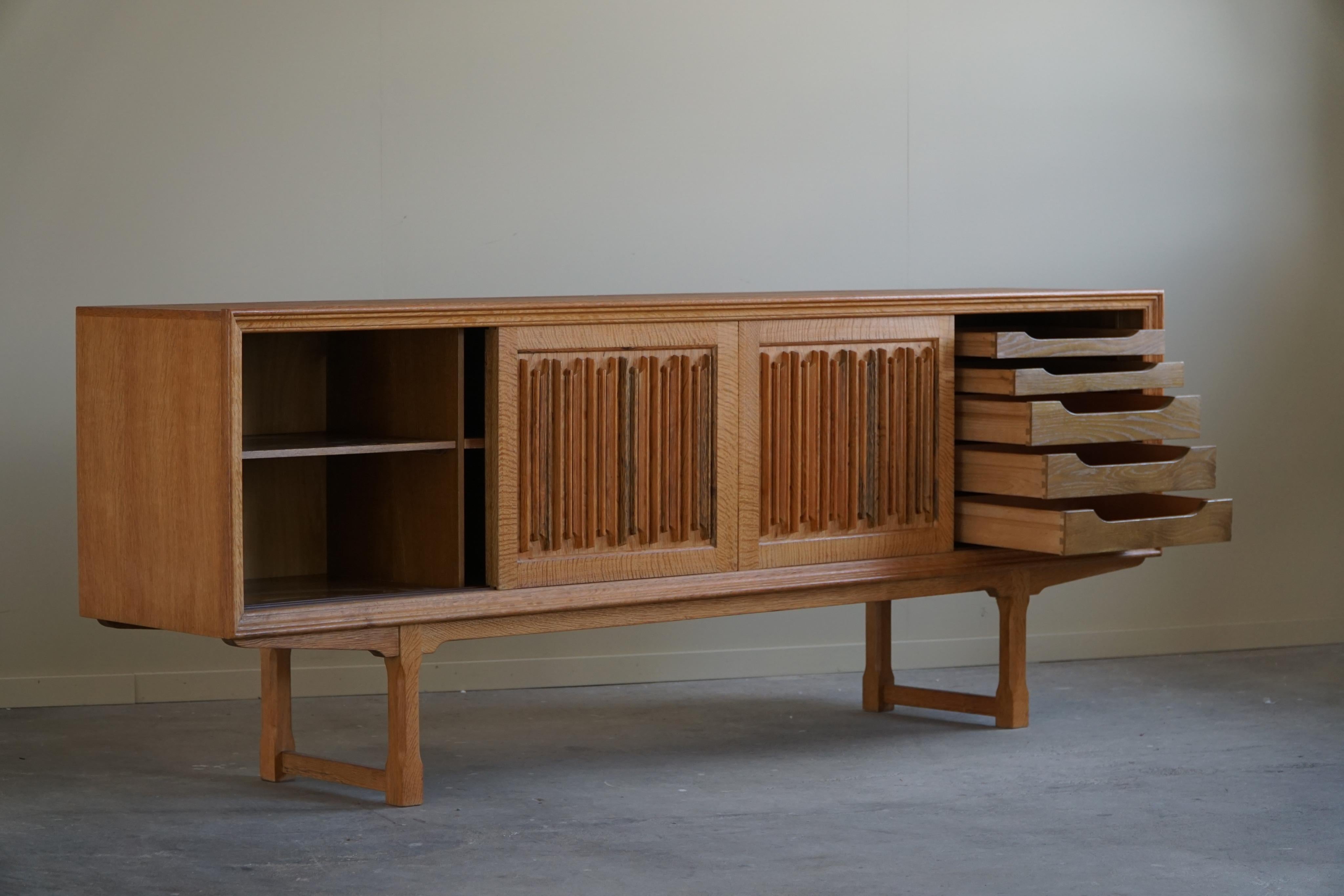 20th Century Midcentury Low Sculptural Sideboard in Oak, Made by a Danish Cabinetmaker, 1960