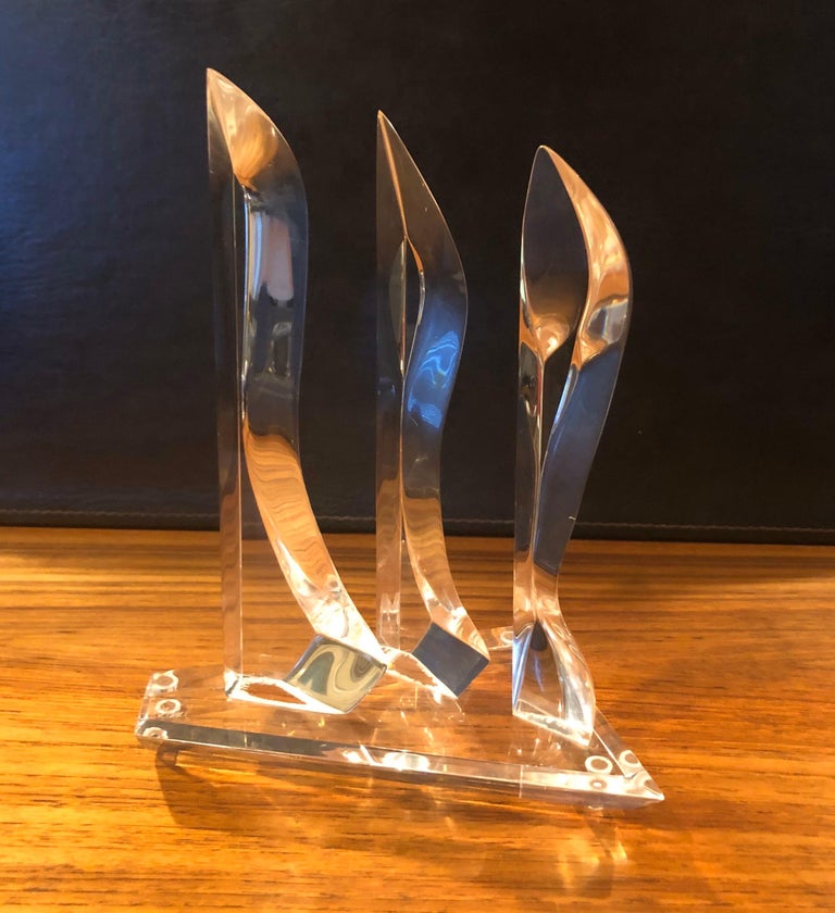 Midcentury Lucite abstract sculpture by Hivo Van Teal, circa 1960s. This beautiful three dimensional sculpture is in great condition with no chips, cracks or crazing. The sculpture measures: 6.75