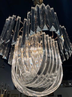 Mid Century Lucite and Brass 13 light Ribbon Chandelier