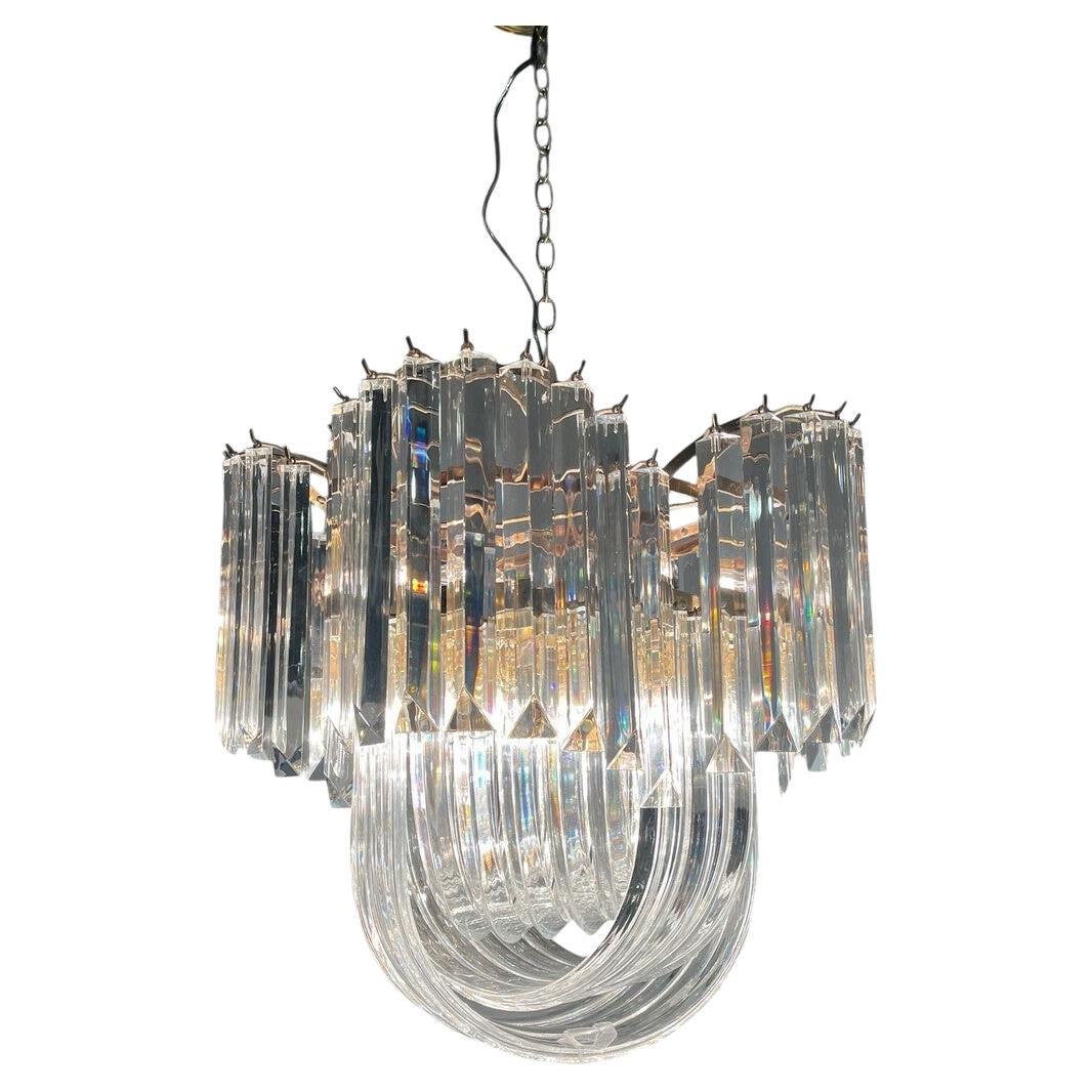 Mid Century Lucite and Brass 13 light Ribbon Chandelier For Sale
