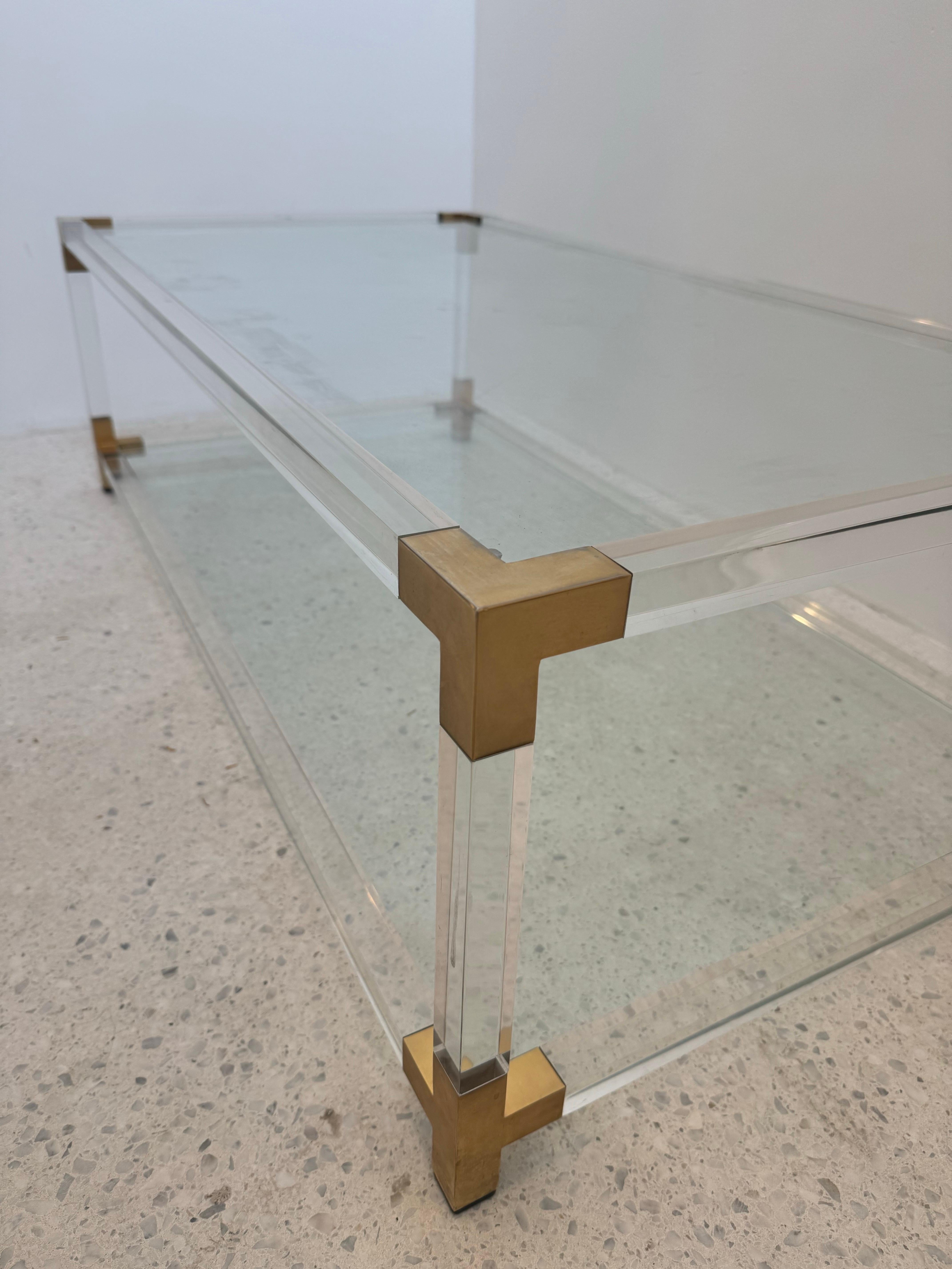 Mid-Century Lucite and Brass Coffee Table with Double Glass Shelves, 1970s In Good Condition For Sale In Brussel, BE