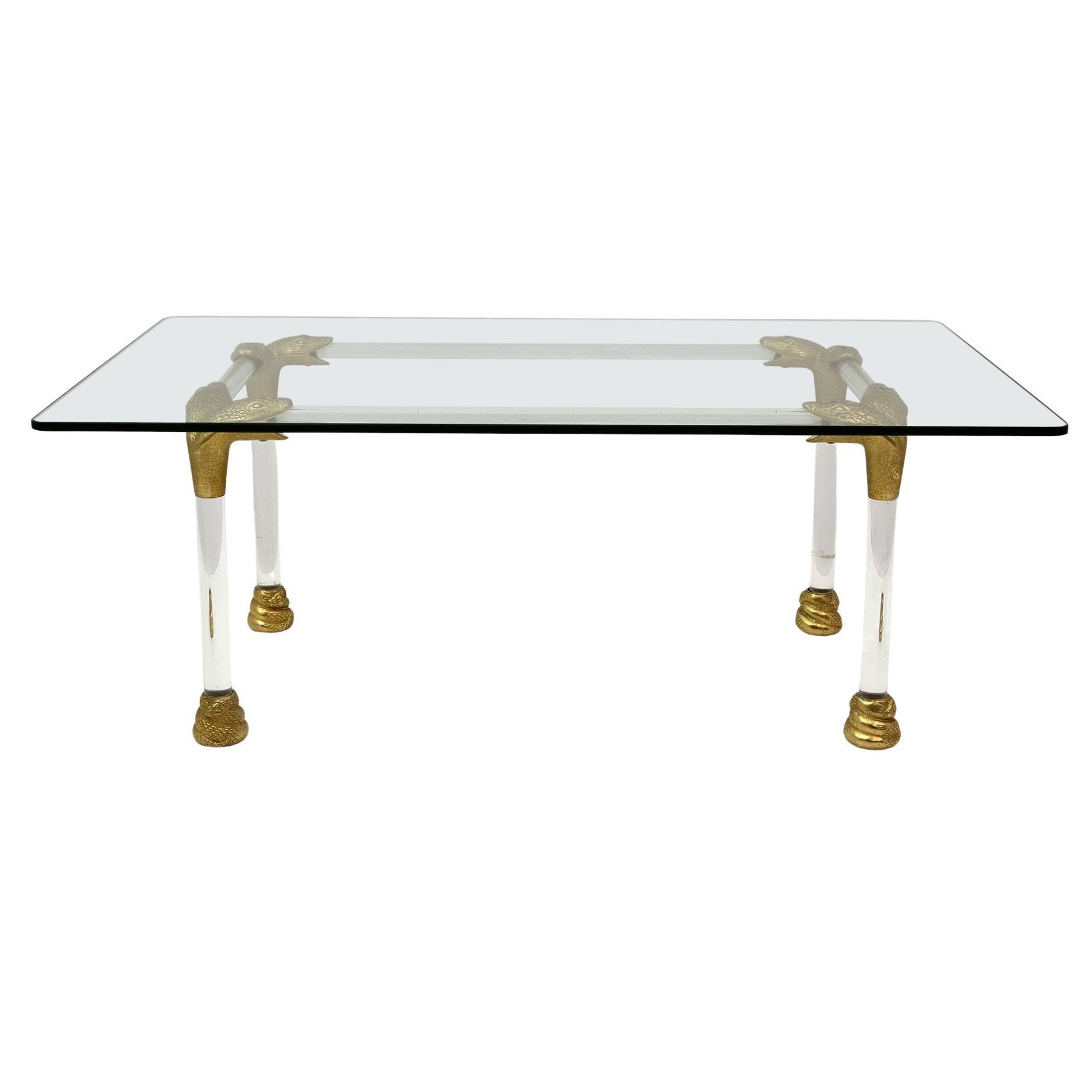 Table basse italienne du milieu du siècle en lucite et laiton avec détails en forme de tête de serpent, 1970