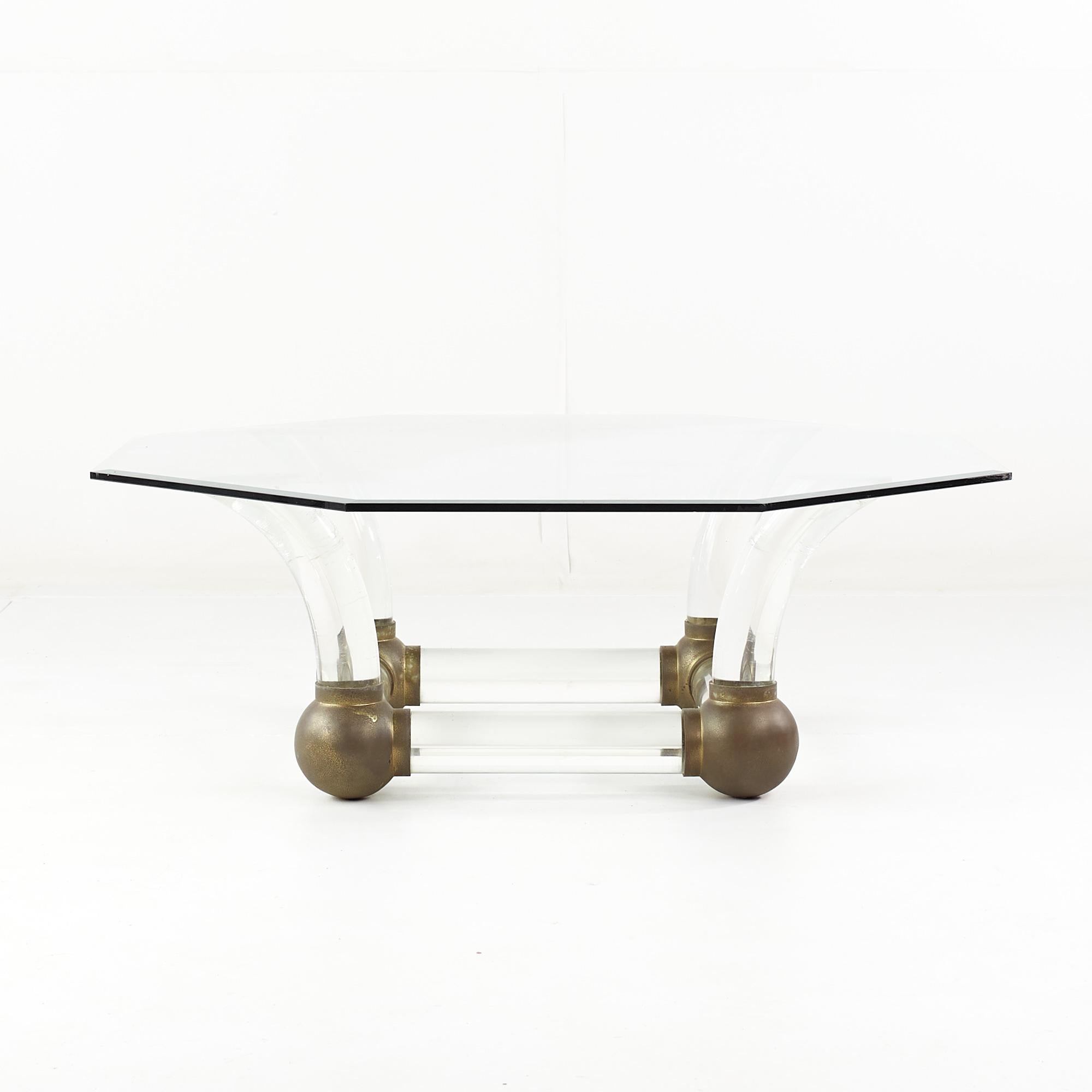 Mid century Lucite and brass tusk coffee table

This table measures: 44 wide x 44 deep x 15 inches high

All pieces of furniture can be had in what we call restored vintage condition. That means the piece is restored upon purchase so it’s free