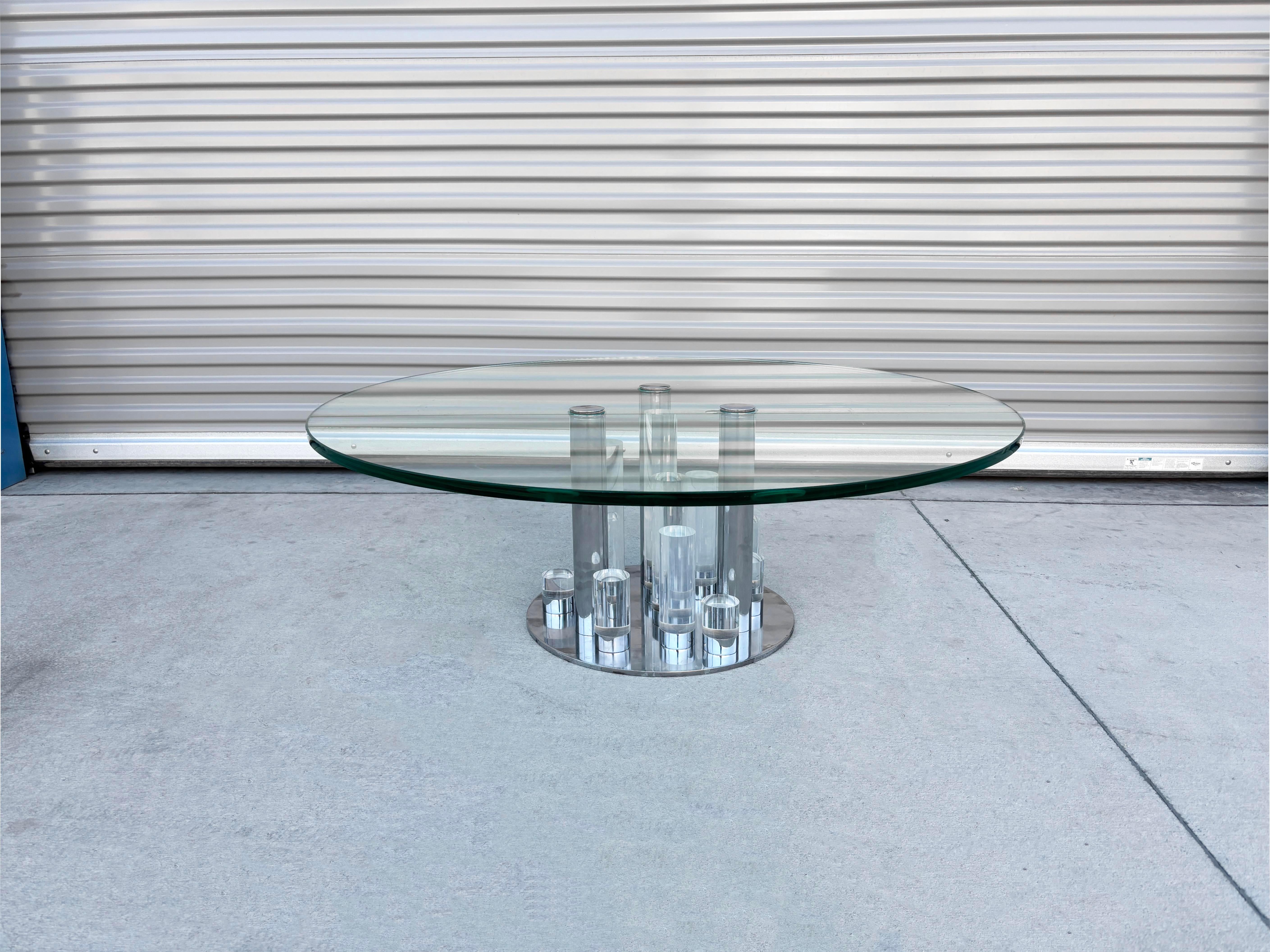 ✨ Mid-Century Glamour in Lucite & Chrome ✨

Designed by the legendary Charles Hollis Jones in the 1970s, this sculptural Lucite and chrome coffee table is a striking example of mid-century modern innovation. Featuring a sleek chrome base and a
