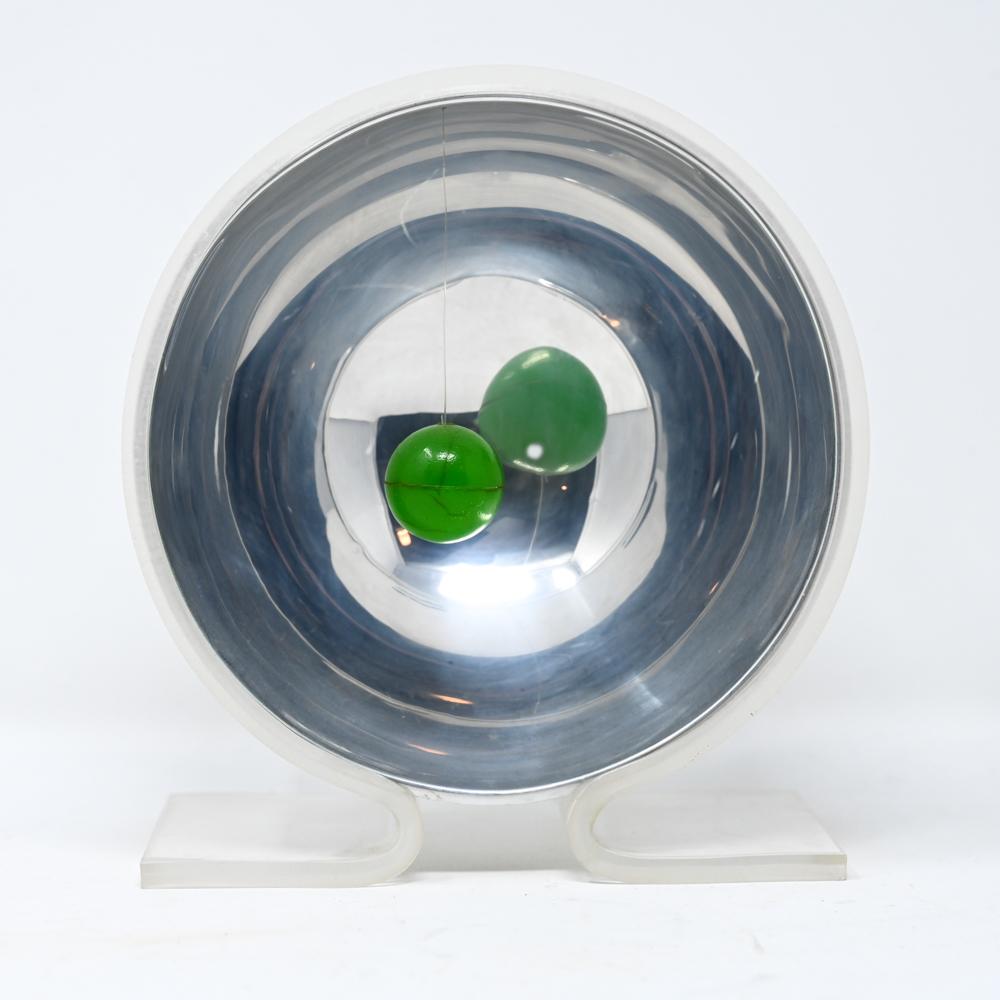 An interesting little mid-century lucite concave mirror sculpture. Unsigned.