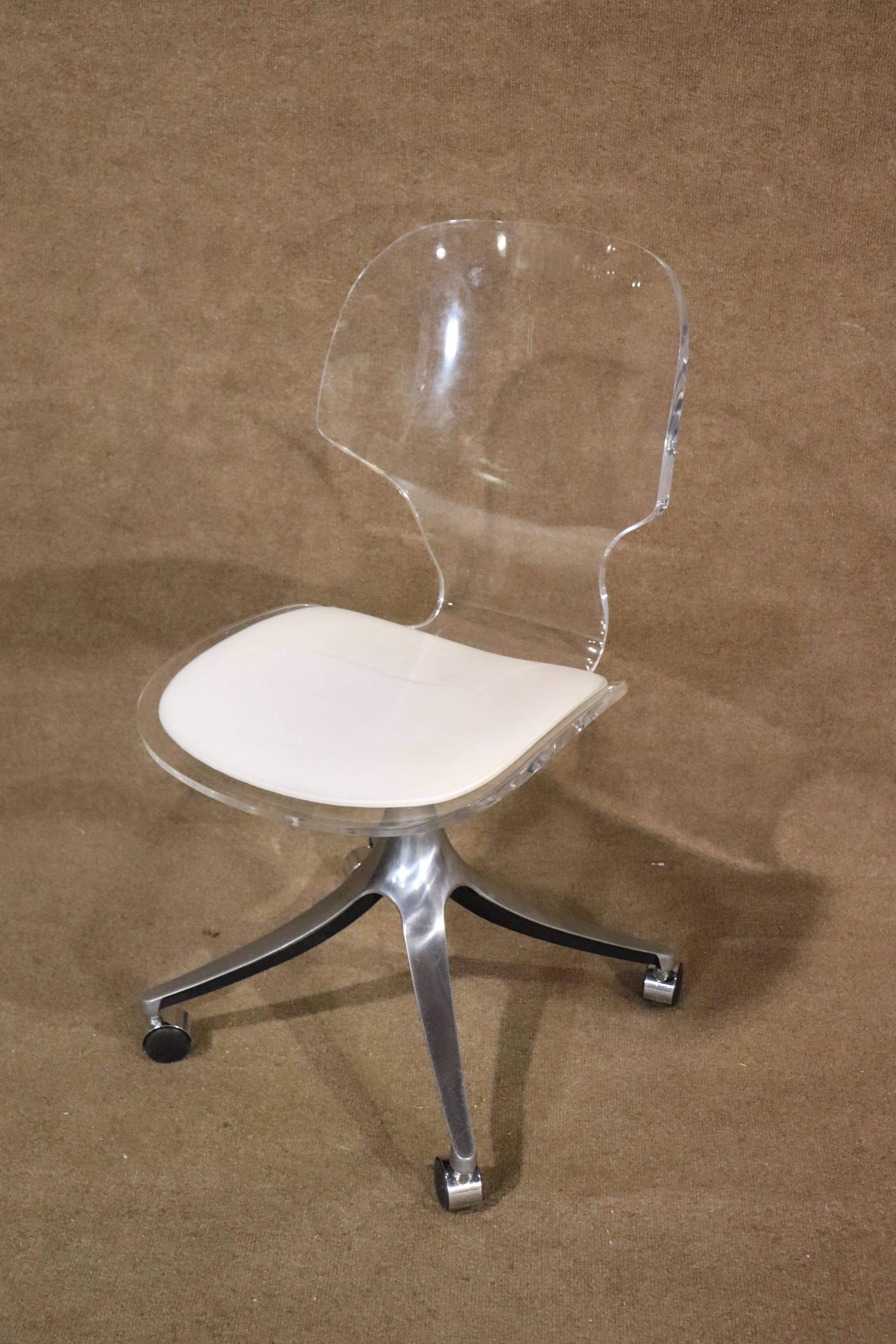 Single mid-century modern office chair on casters. Sleek lucite body with white cushioned seat. Made by Hill Manufacturing Company for home and office use.
Please confirm item pickup location (Brooklyn or New Jersey) with seller.