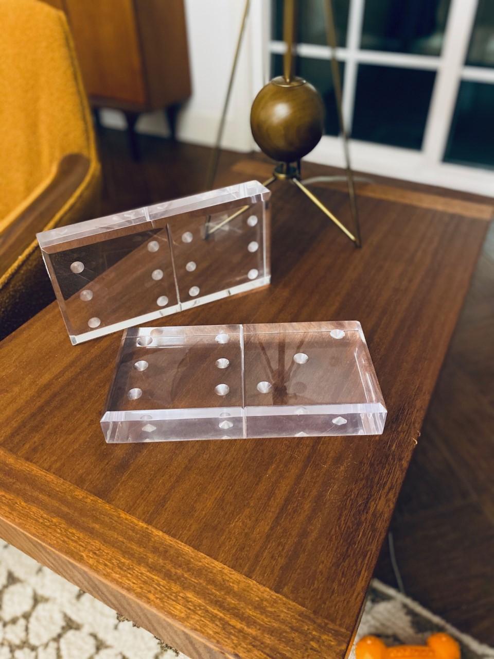 Beautiful pair of midcentury Lucite Domino sculptures. Interesting and sculptural additions to your décor. Sculptural on their own or could be used as bookends.