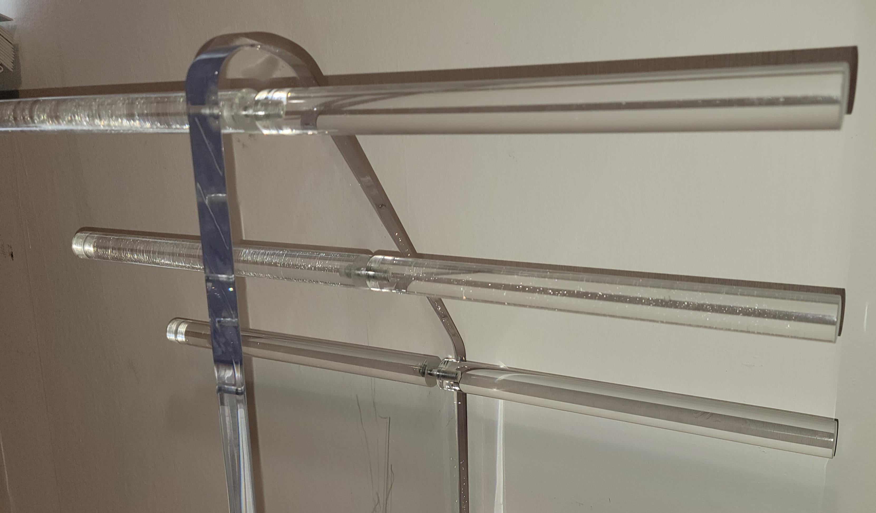 Mid Century Lucite Valet Towel or Blanket Rack with six arms. Great weight thick base and stem. Very sturdy and strong. 
