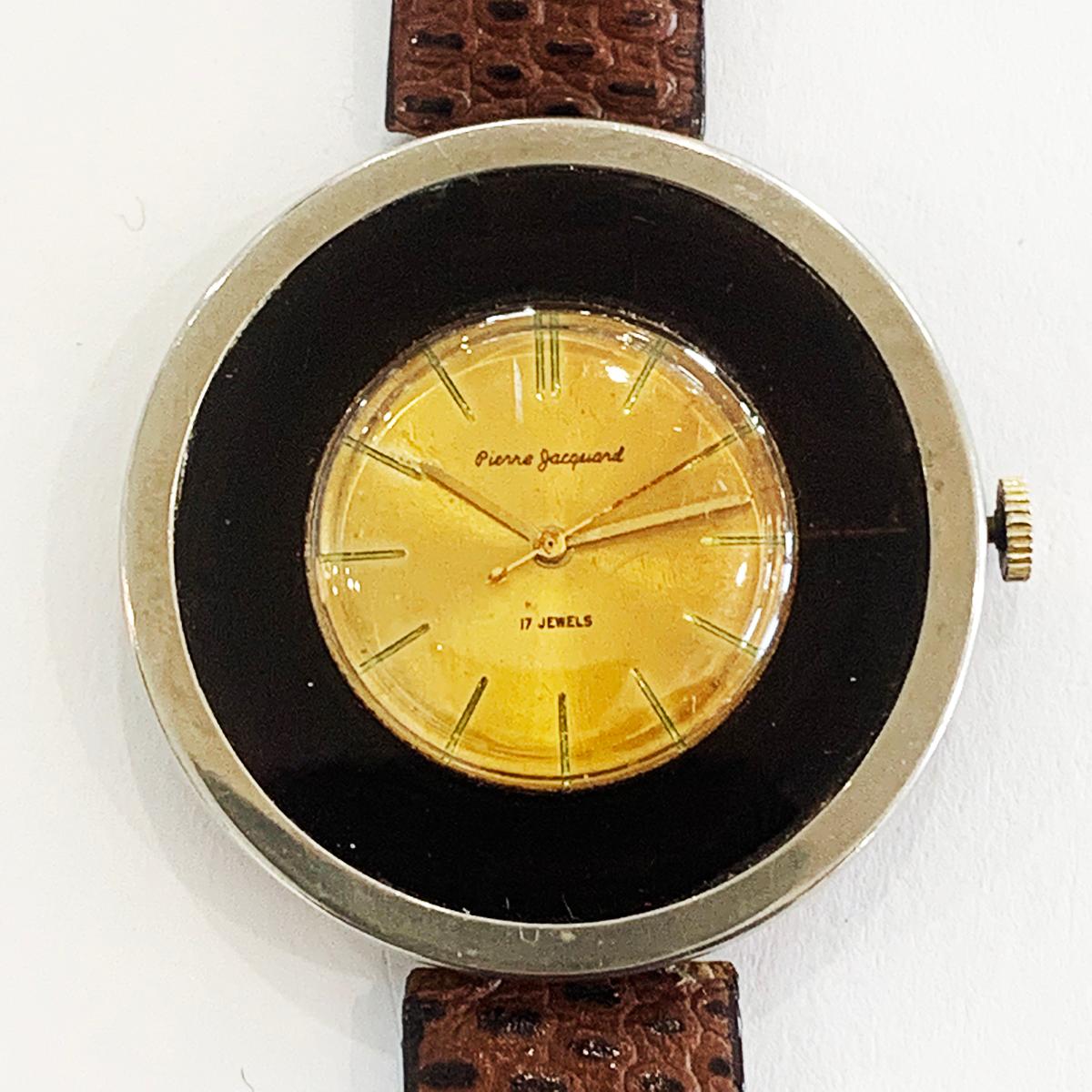 Mid Century, Honey Swirl Bakelite and Gilt Clamper Wrist Watch. All in excellent condition, with a fine, stippled surface to the Bakelite, keeping good time for age, checked, cleaned and timed. Slight age patina to rear of watch, but face is