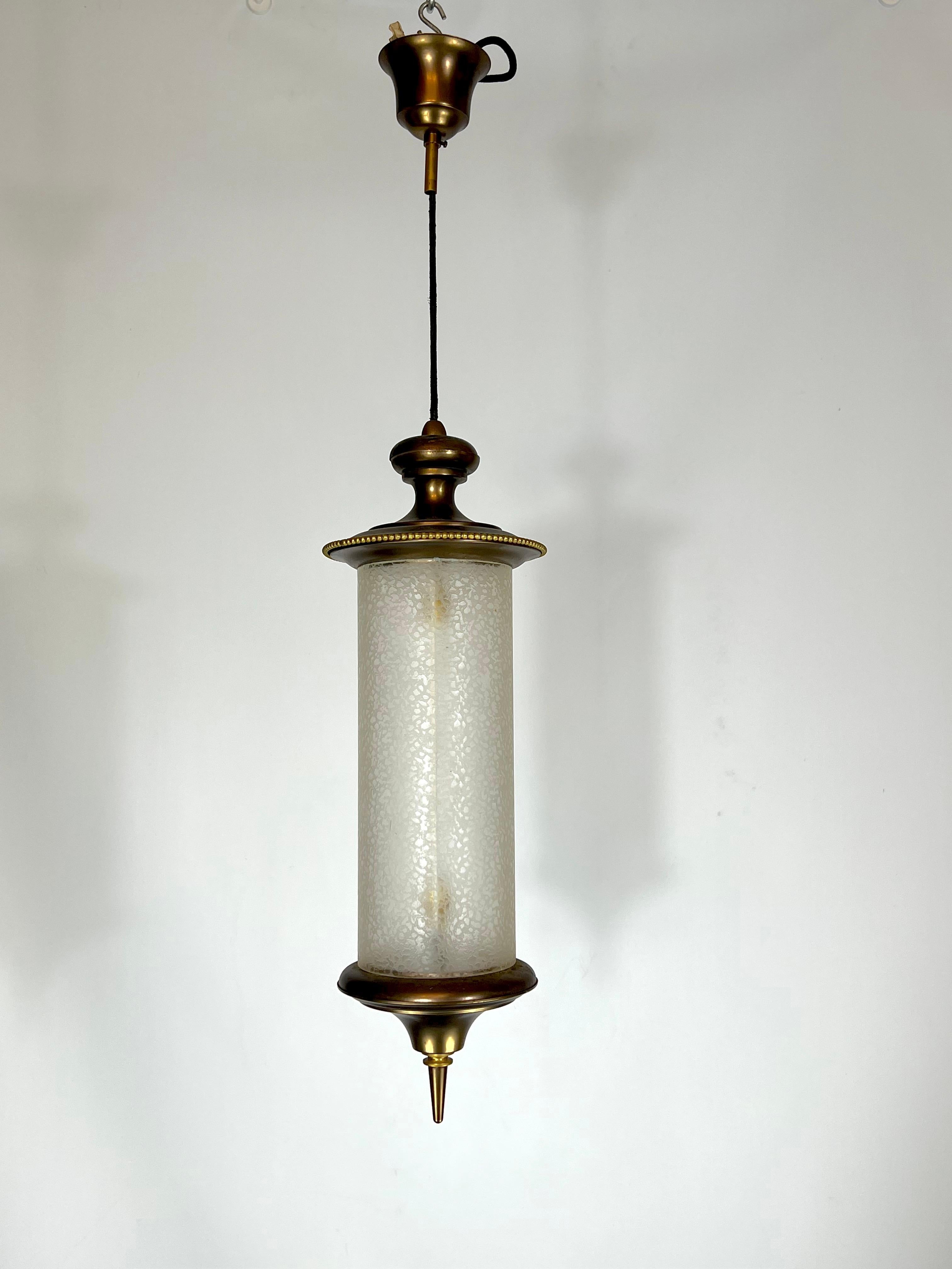 Good vintage condition with normal trace of age and use. Original patina on the brass. It is made from brass and glass. Produced by Lumi Milano during the 50s. Fixture height without rod 50 cm. Full working with EU standard, adaptable on demand for