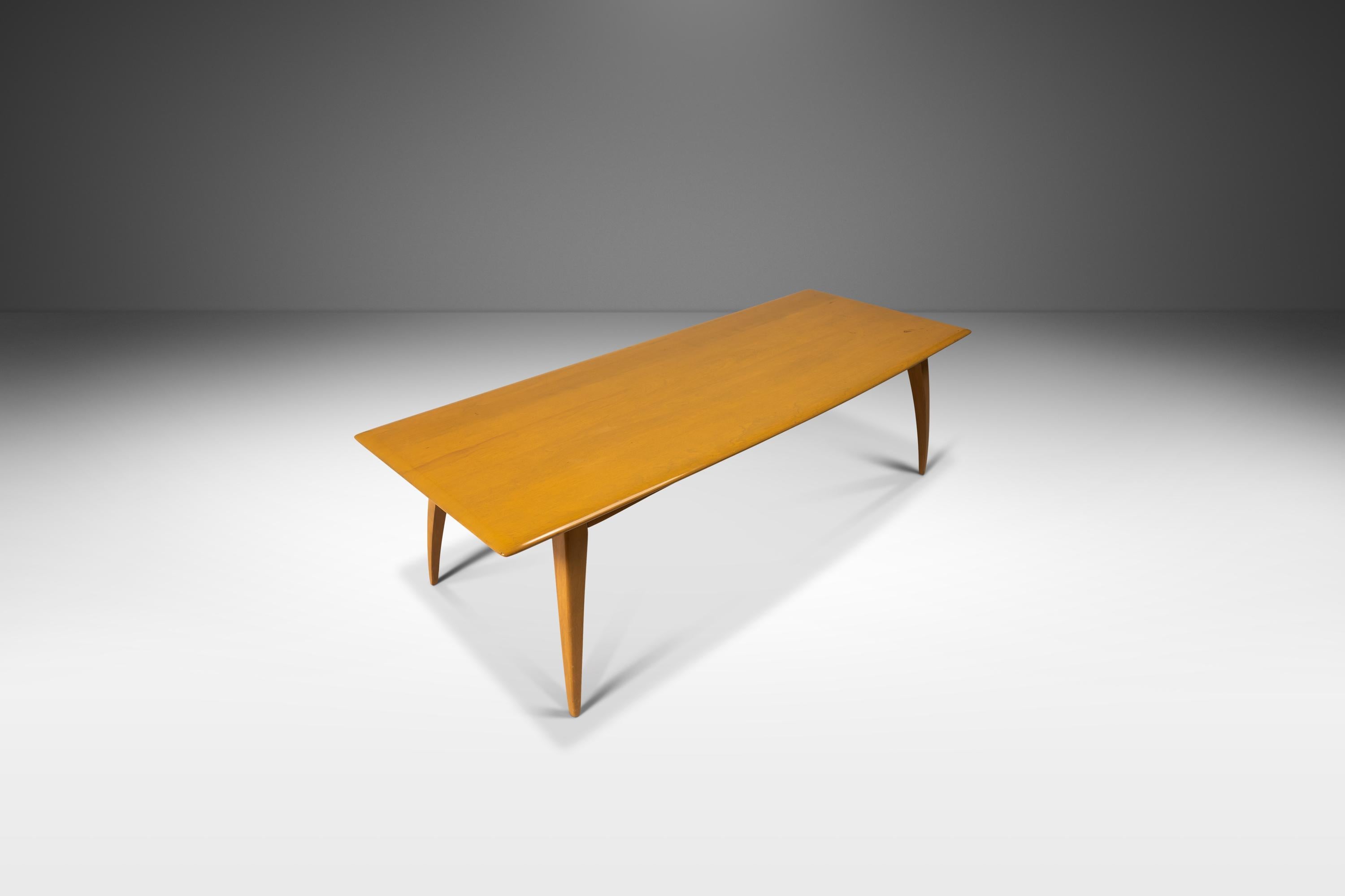 Introducing the Model M5105 coffee table by Haywood Wakefield stamped August 23, 1957. Constructed from solid birch this perfectly retro piece is the epitome of American Mid Century Modern design and is in 100% original, vintage condition. Featuring