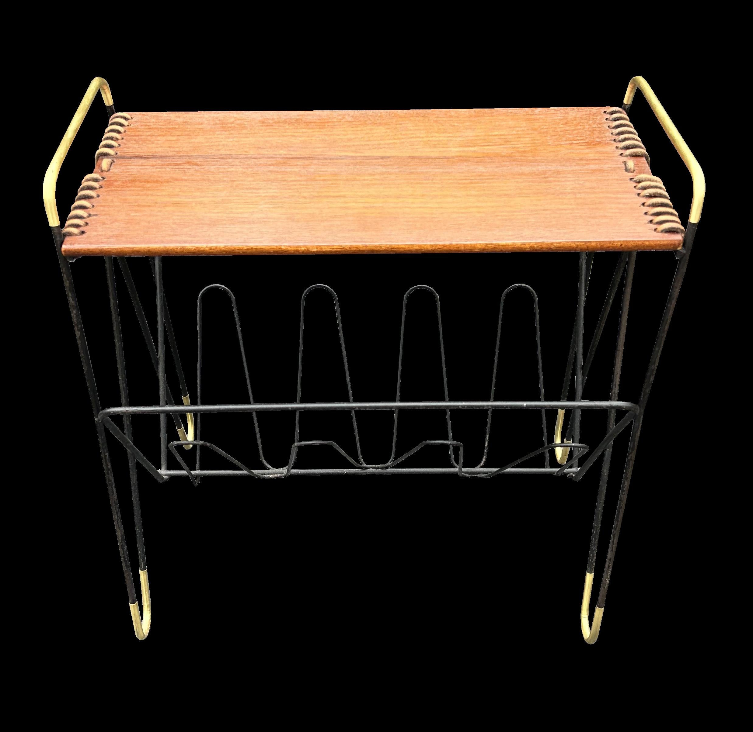 A very cool unusual Magazine Rack/Table, designed in the 1950's and made from stell rod in black with gold coloured feet, and with a Teak top 'Sewn' to the base with leather.