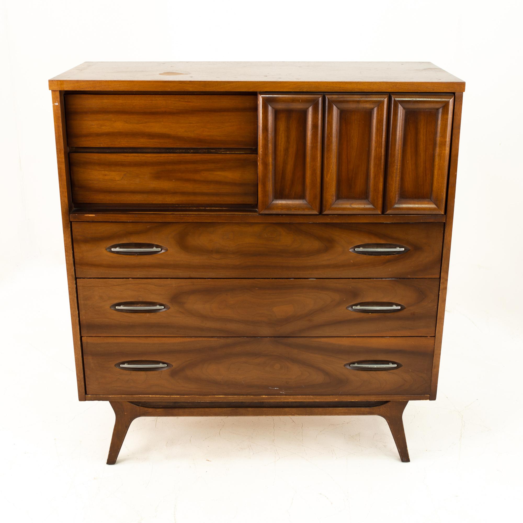 Mid Century magna highboy
Highboy measures: 42 wide x 18 deep x 46.5 high

This price includes getting this piece in what we call restored vintage condition. That means the piece is permanently fixed upon purchase so it’s free of watermarks, chips