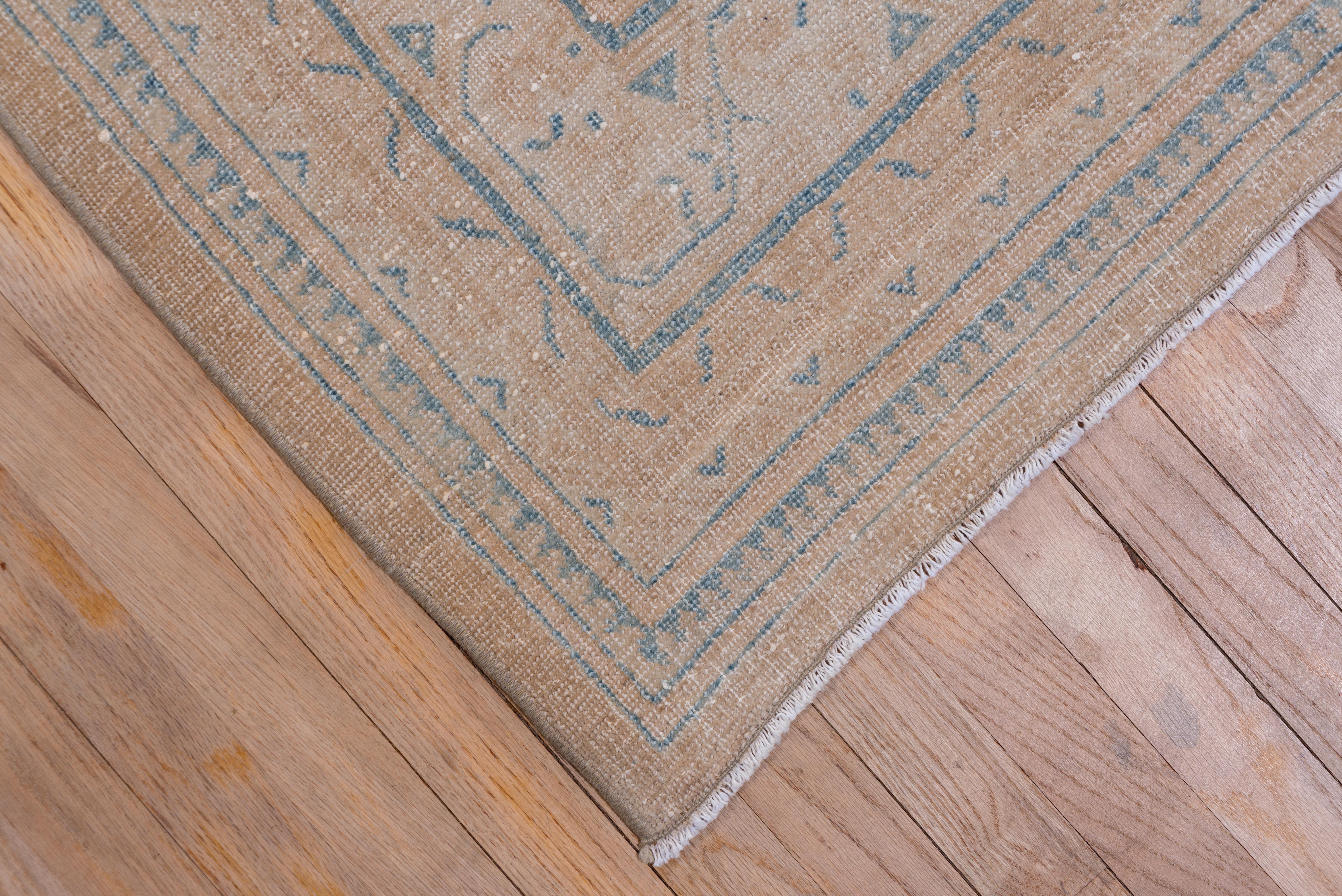 Could be a very light Saraband instead of a Mahal. Still west Persian, however. The very soft, overall beige and sand palette features rows and rows of little offset floriated botehs while the multiple border system shows the main stripe in straw