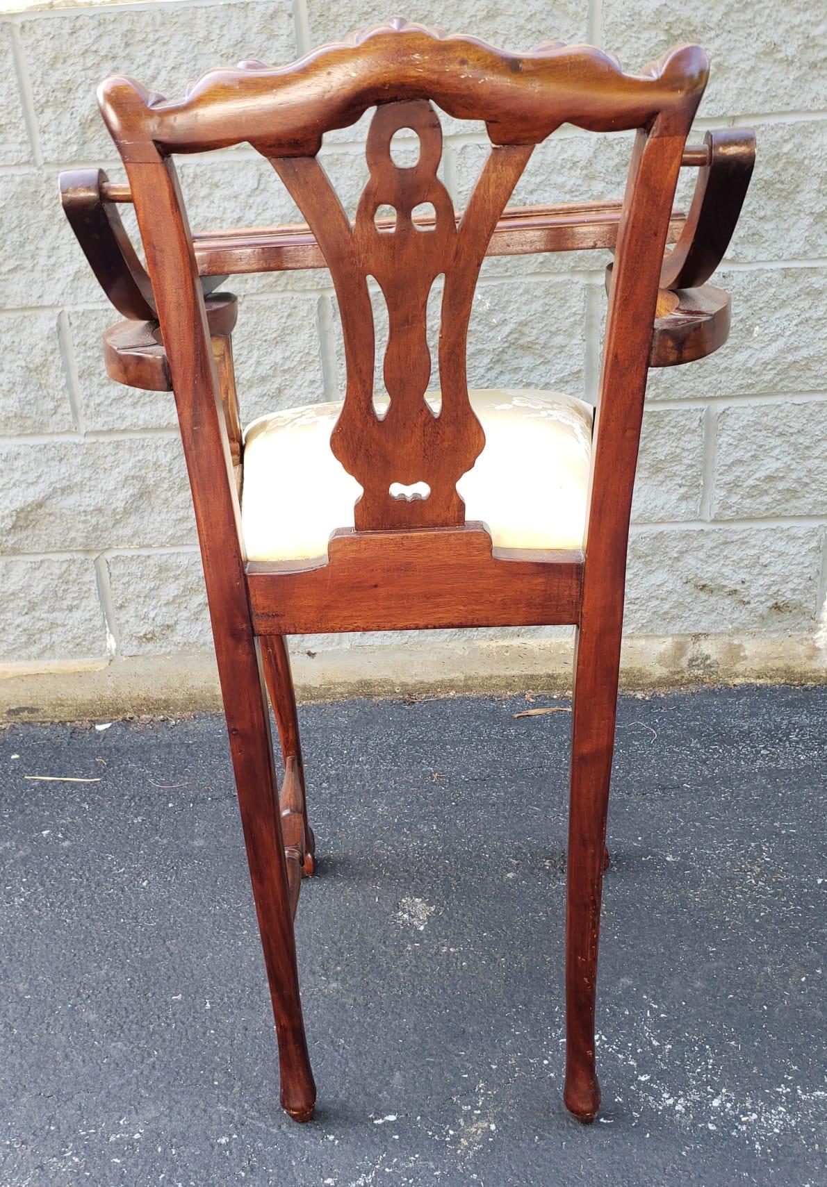 A very rare, Mid-Century hand-crafted Mahogany Chippendale Style Fruitwood High Chair with Tray with cabriole legs carved with acanthus leaves and terminating with ball and claw feet.  Measures 20