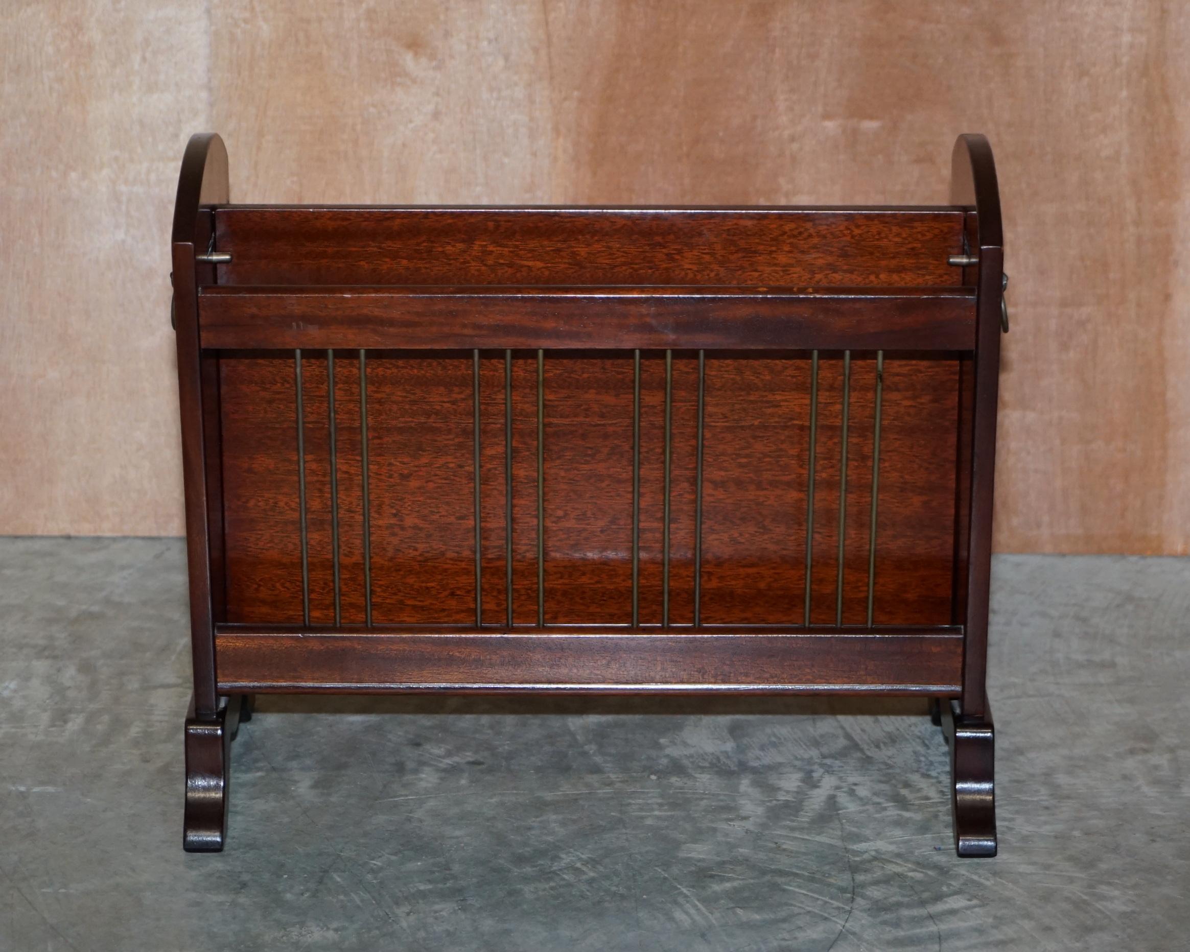We are delighted to offer this lovely circa 1950-1960 Bevan Funnell mahogany magazine newspaper rack with Lion’s head handles

A good looking, decorative and well made piece. The hands depict Lion’s mains which are very decorative, the middle