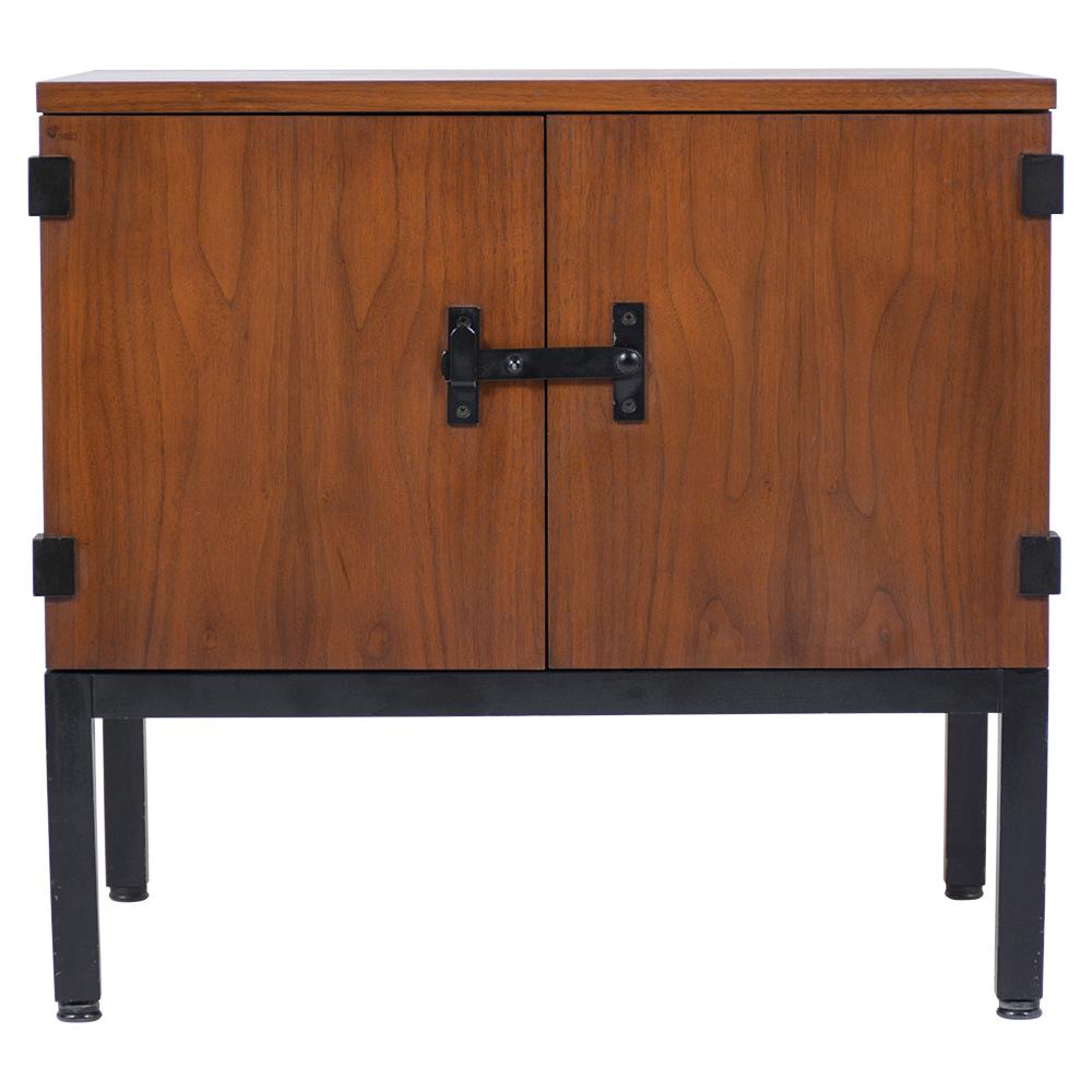 A sleek vintage 1960s mid century modern nightstand made out of walnut wood with a newly stained in walnut & ebonized color combination with a newly lacquered finish and has been completely restored by our team of expert craftsmen in house. The end