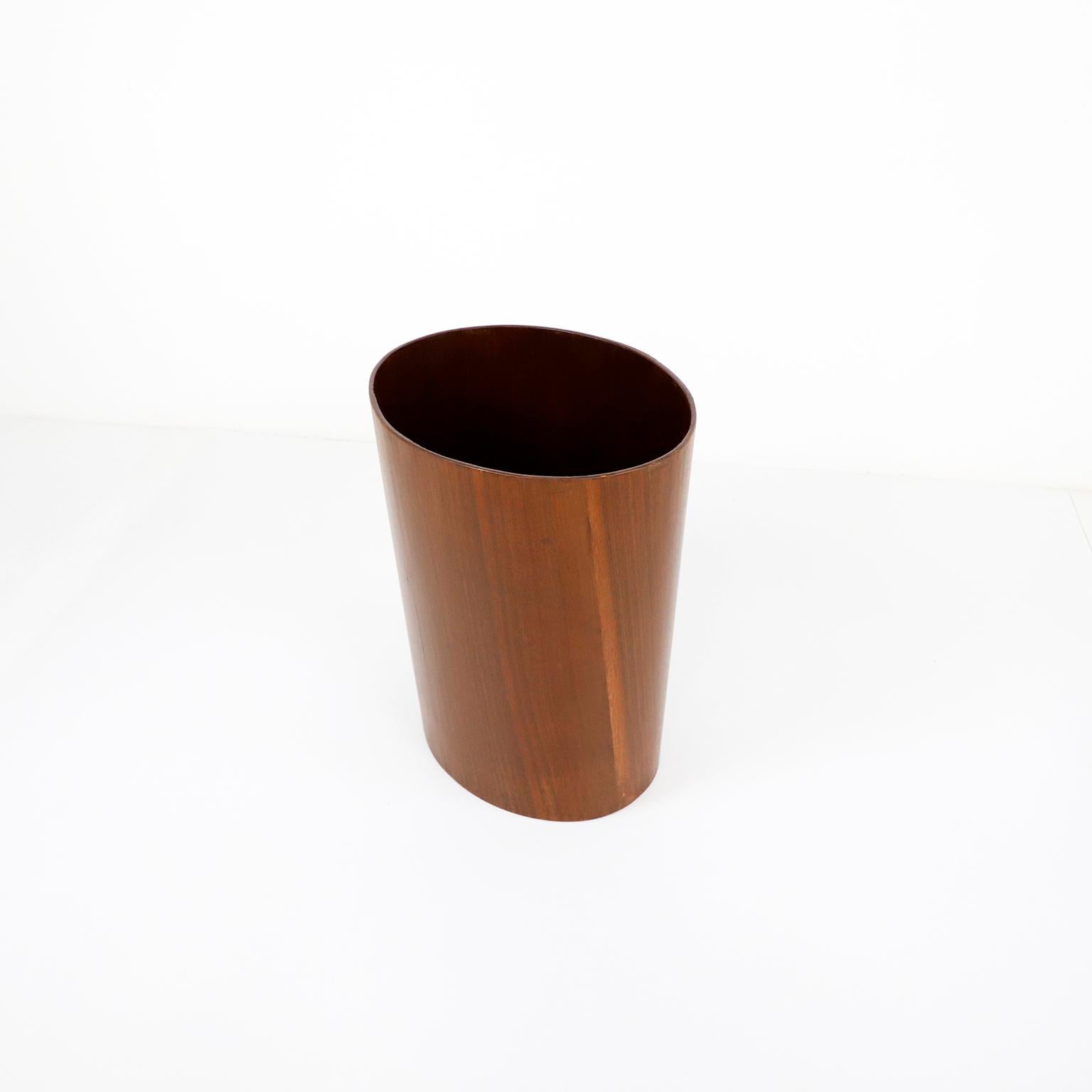 Circa 1960, We offer this mid century Mahogany Plywood trash can. Recently restored.