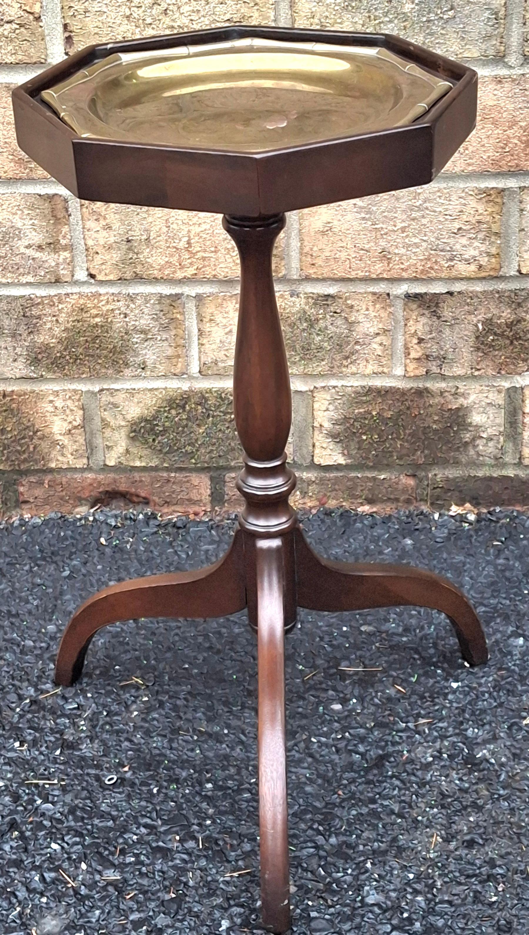 A Mid 20th Century Mahogany Spide Legs Octogonal Candle Stand With Solid Brass Tray Top
Measures: 14