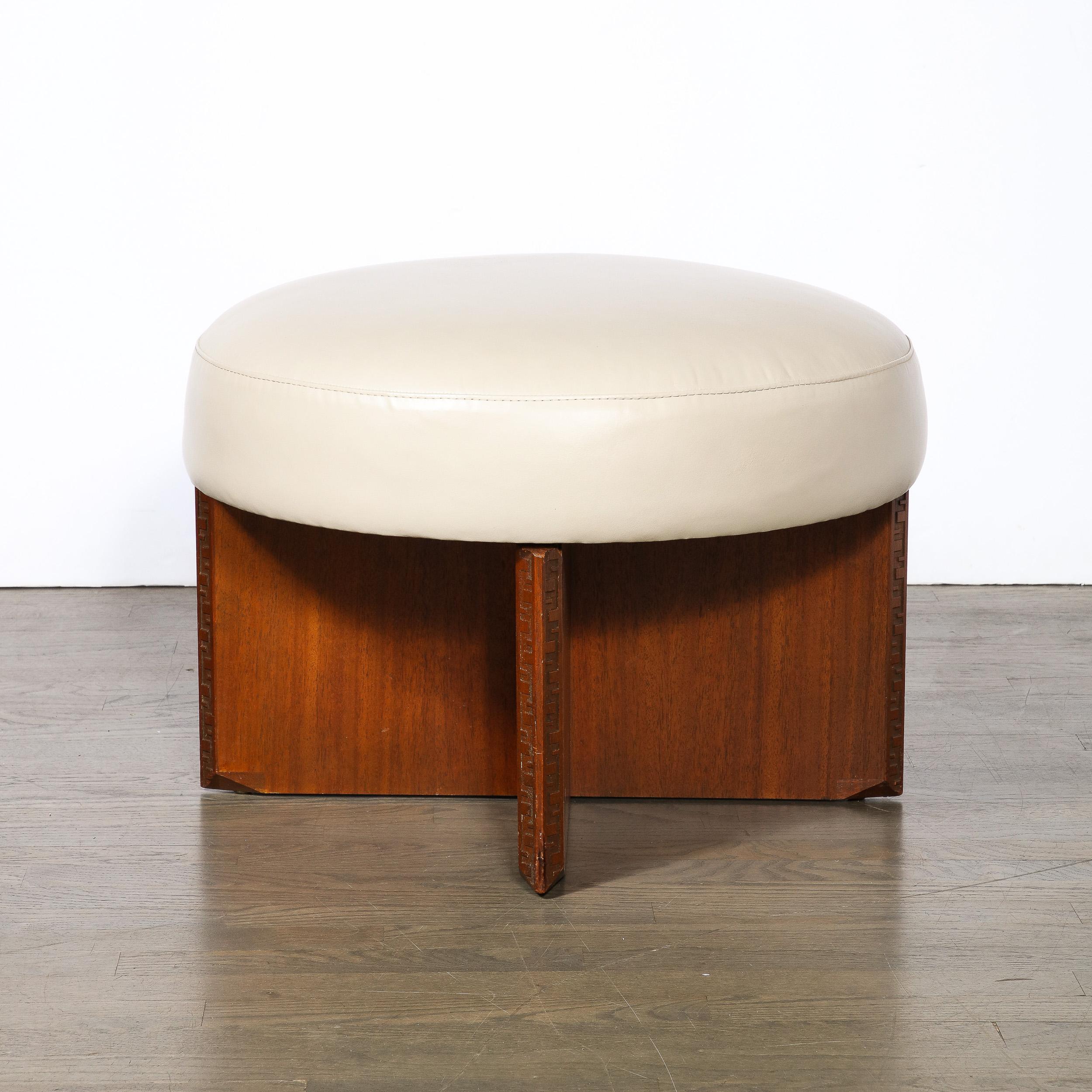 This rare and highly sought after Mid-Century Modernist Rotating Stool/ Ottoman in Holly Hunt Leather is by Frank Lloyd Wright for Heritage Henrendon, and originates from the United States, C. 1955/56. Features a rectilinear x-form base in Mahogany