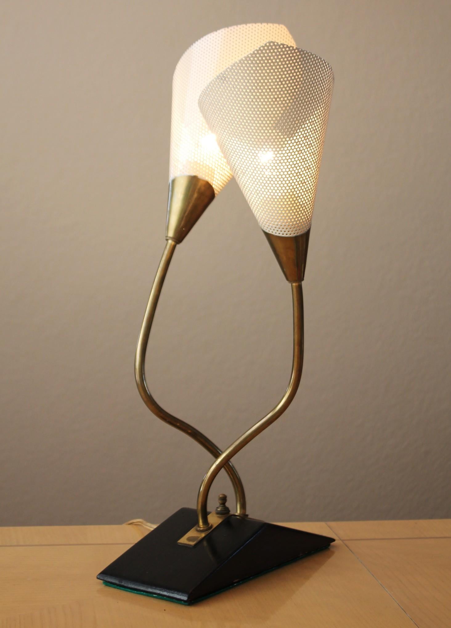 MAJESTIC MID CENTURY TABLE LAMP

STUNNING!

PERFORATED SCREENS
WOOD & BRASS


EXQUISITE MID CENTURY ELEGANCE! 

HEIGHT: 20