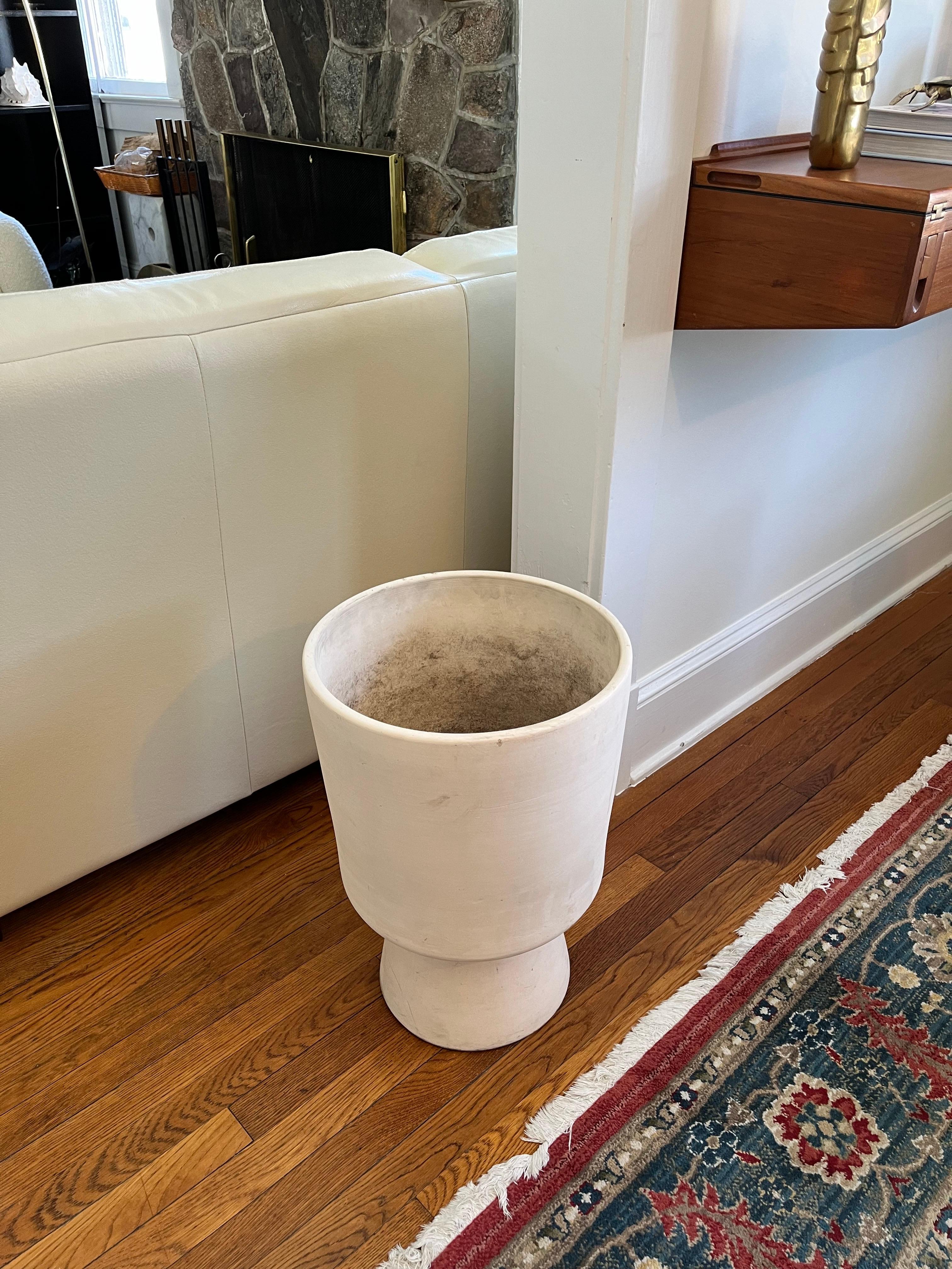 Large unglazed planter designed by Malcolm Leland for the Southern California company Architectural Pottery circa 1950s. The bisque finish was designed to let the water evaporate when the planter was used indoors. The Chalice form is wonderful