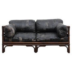 Vintage Mid-Century Manou Bamboo and Black Patchwork Leather Loveseat