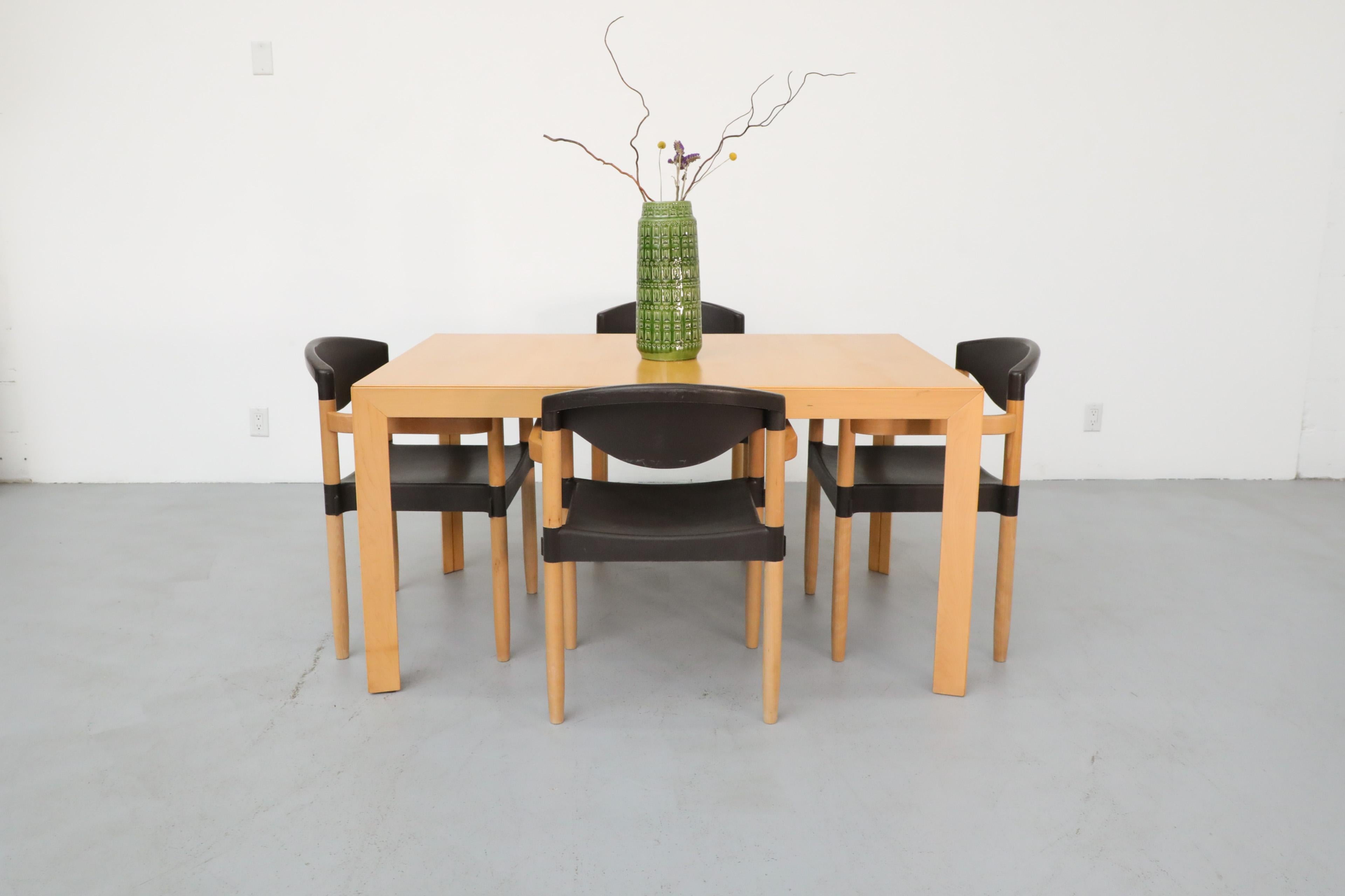 Mid-Century maple extendable dining table with two leaves. The table can be extended with one or both leaves making it 94