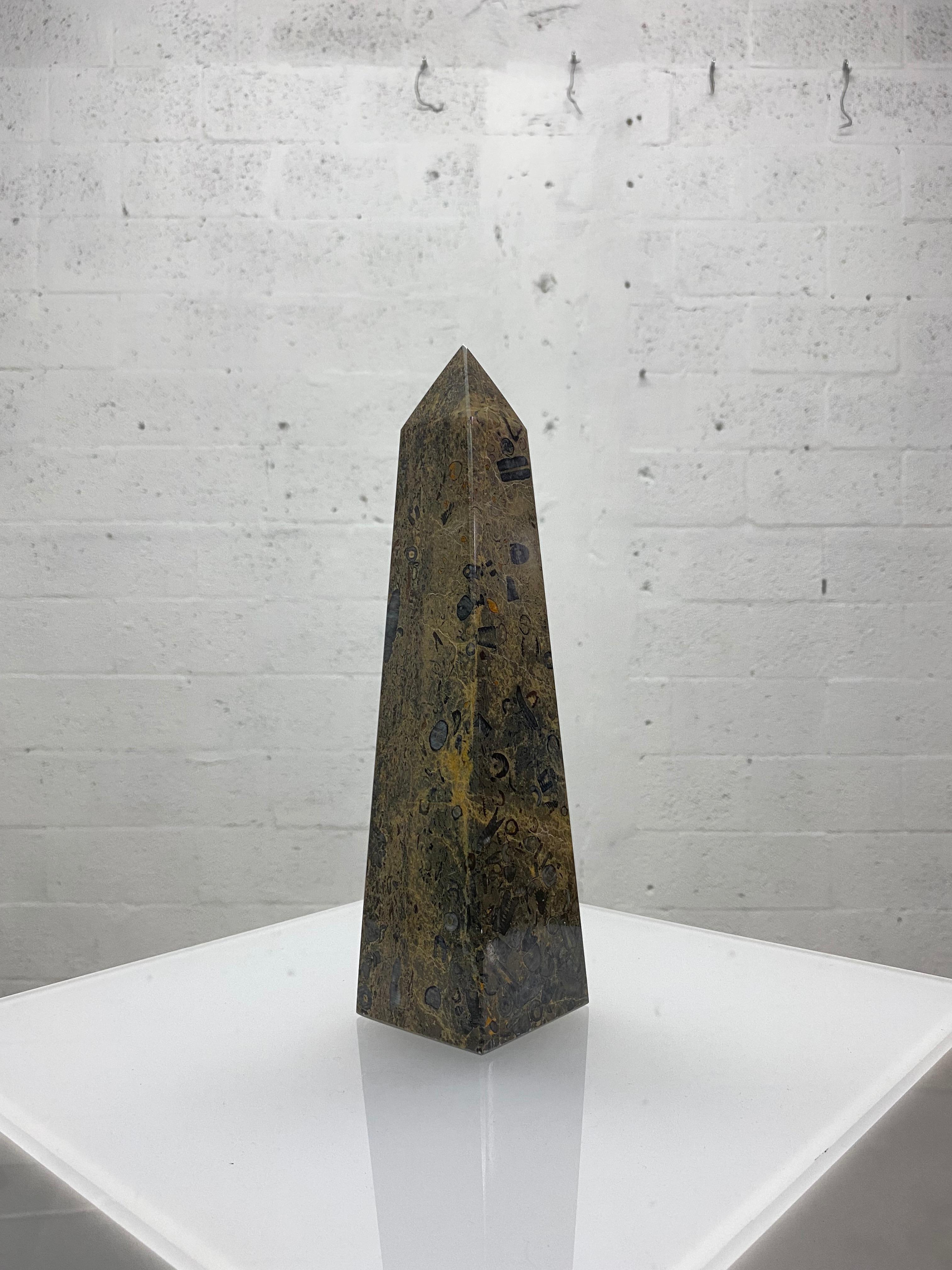 Single mable obelisk from the 1970s.