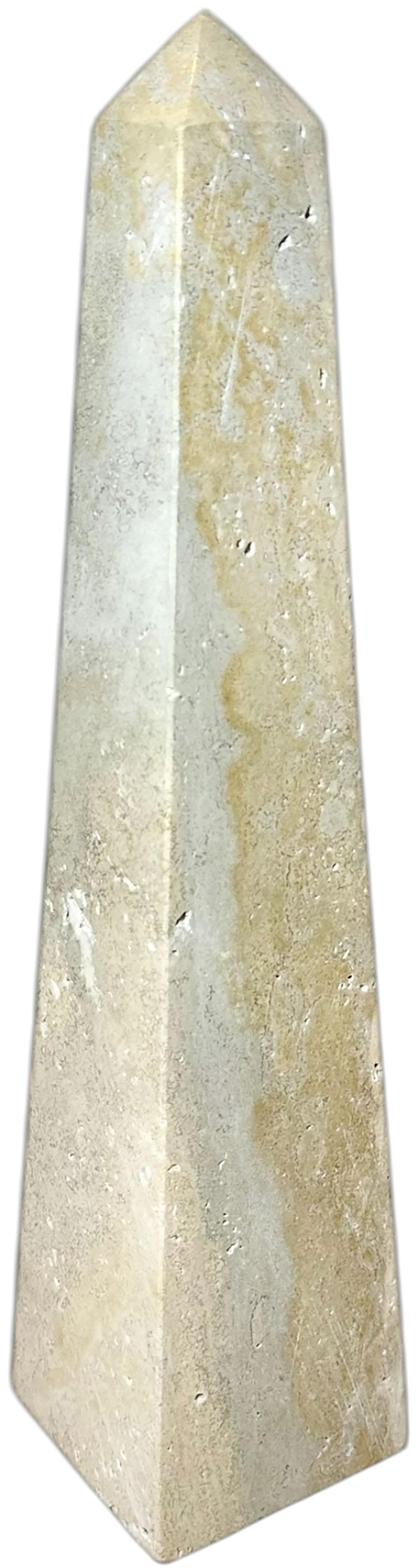 Un obelisco d'epoca in travertino lucidato, utilizzato da un famoso decoratore negli anni '70. 
