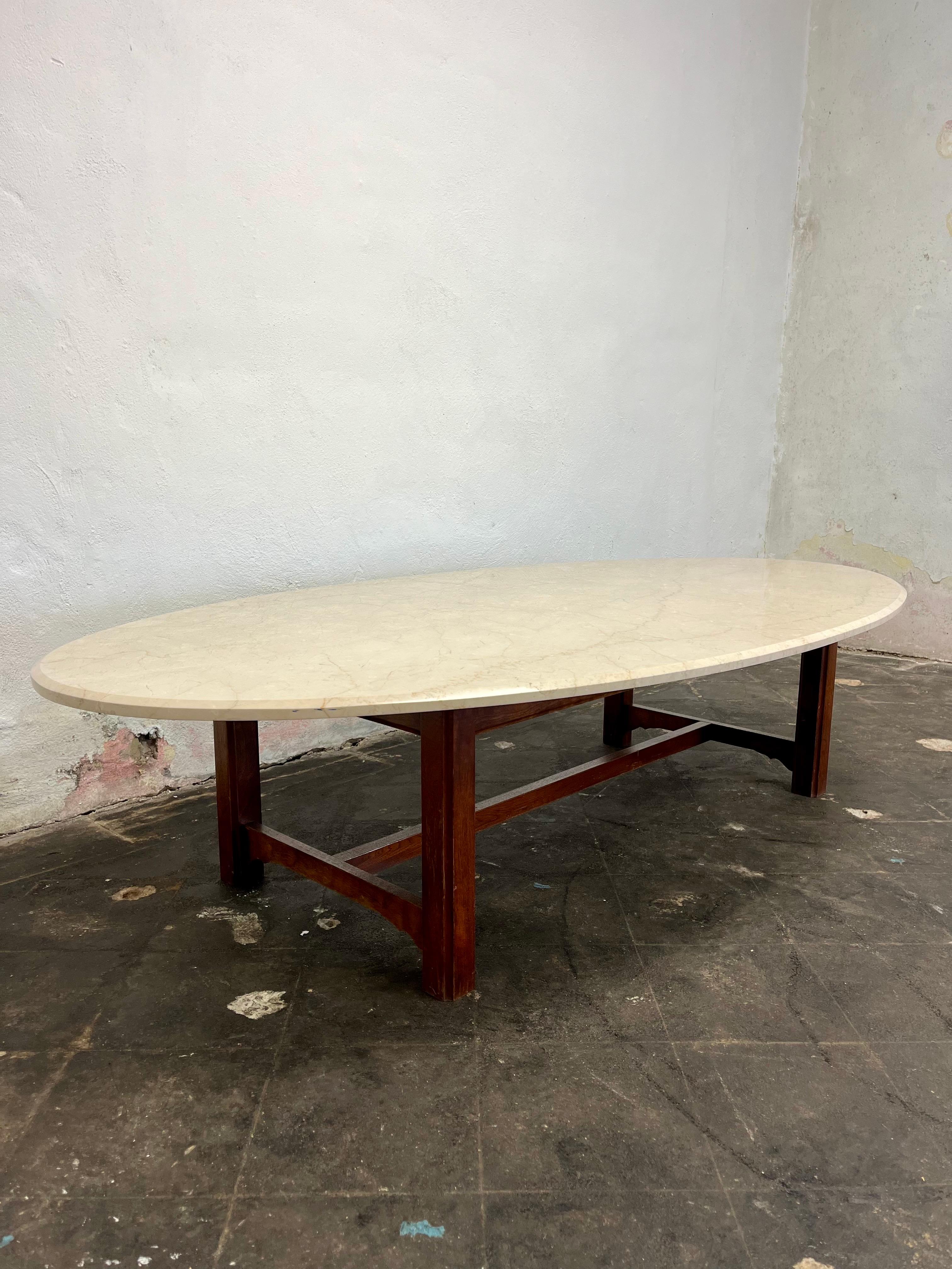 Oval beveled edge surfboard on wood base. Sleek design. Stone top in polished marble or travertine.
Curbside to NYC/Philly $350(will need muscle due to weight)