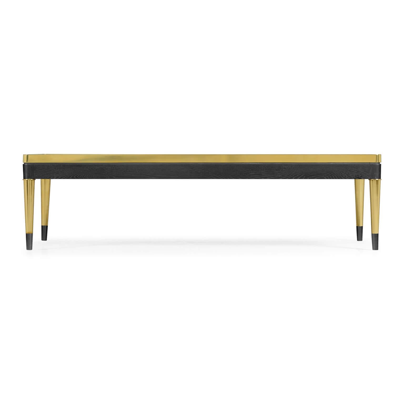 Mid-Century Modern style marble top rectangular coffee table with brass trim and an ebonized oak frame on round tapered legs.

Dimensions: 60