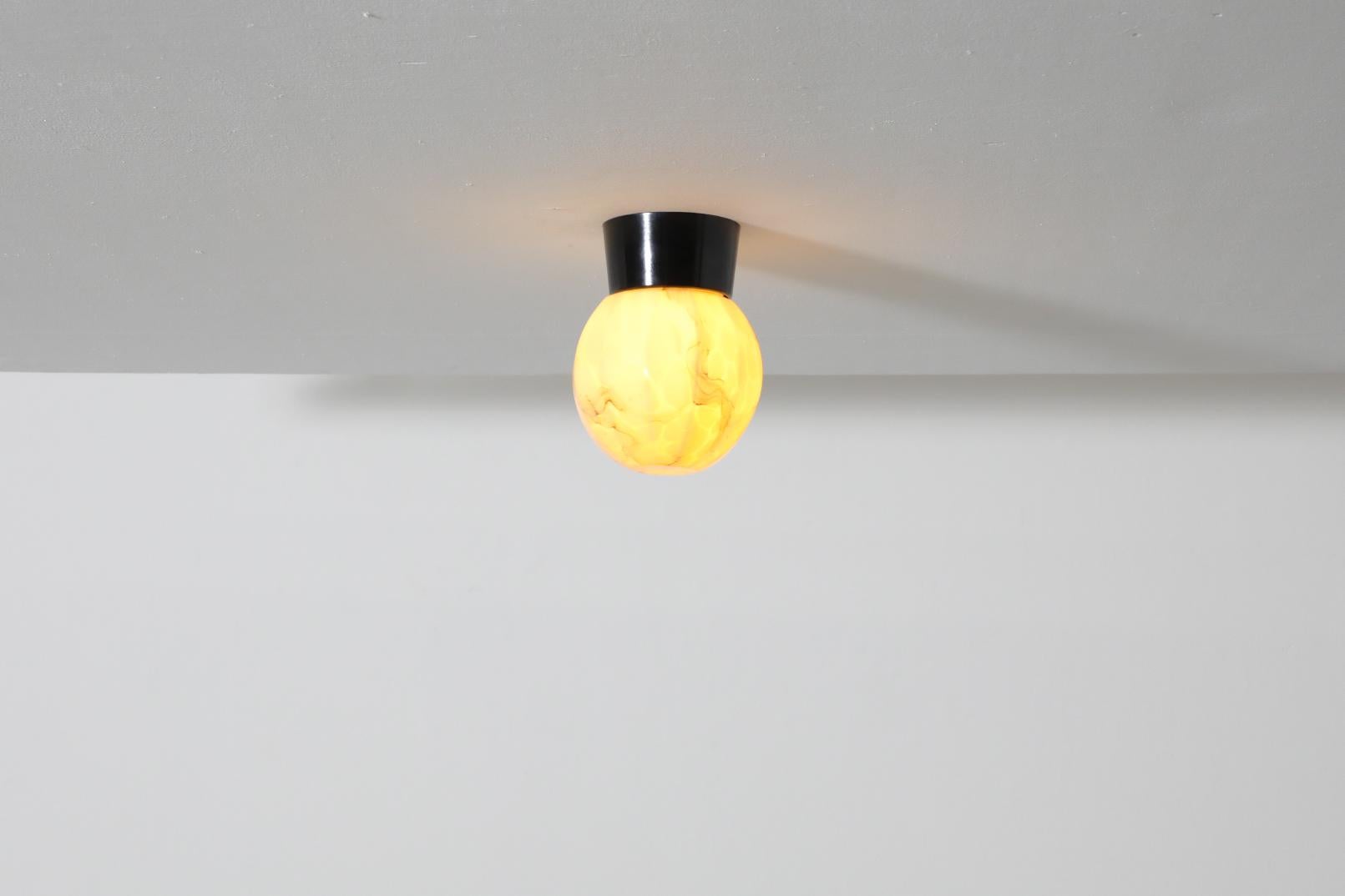 Mid-Century Modern Mid-Century Marbled Flush Mount Glass Globe Sconce with Black Bakelite Base