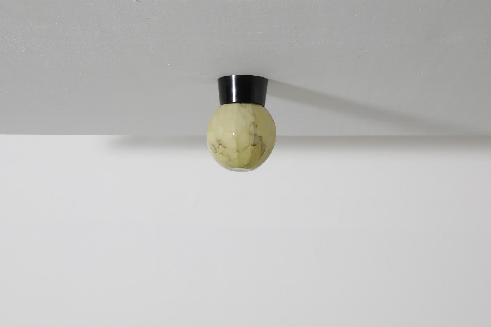 Dutch Mid-Century Marbled Flush Mount Glass Globe Sconce with Black Bakelite Base
