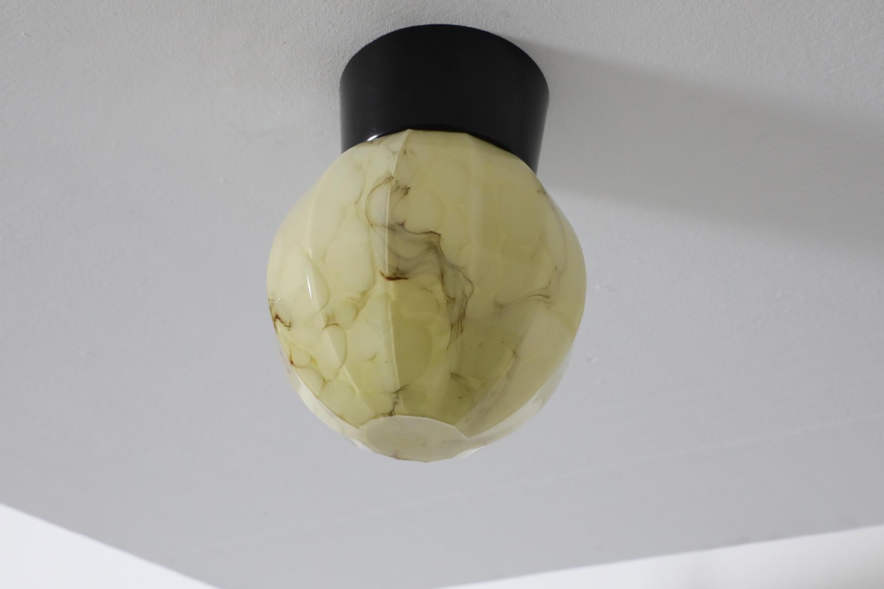 Mid-Century Marbled Flush Mount Glass Globe Sconce with Black Bakelite Base 1