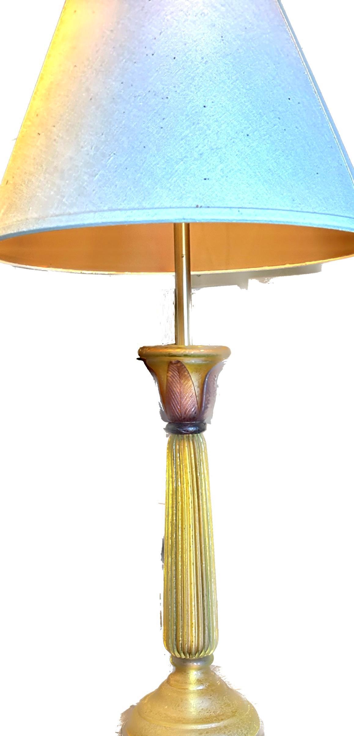 Made by Marbro Lamp co.  Beautifully made in luminescent amber satin glass with accent darker petals.  22” to the glass top.  Shade not included.
