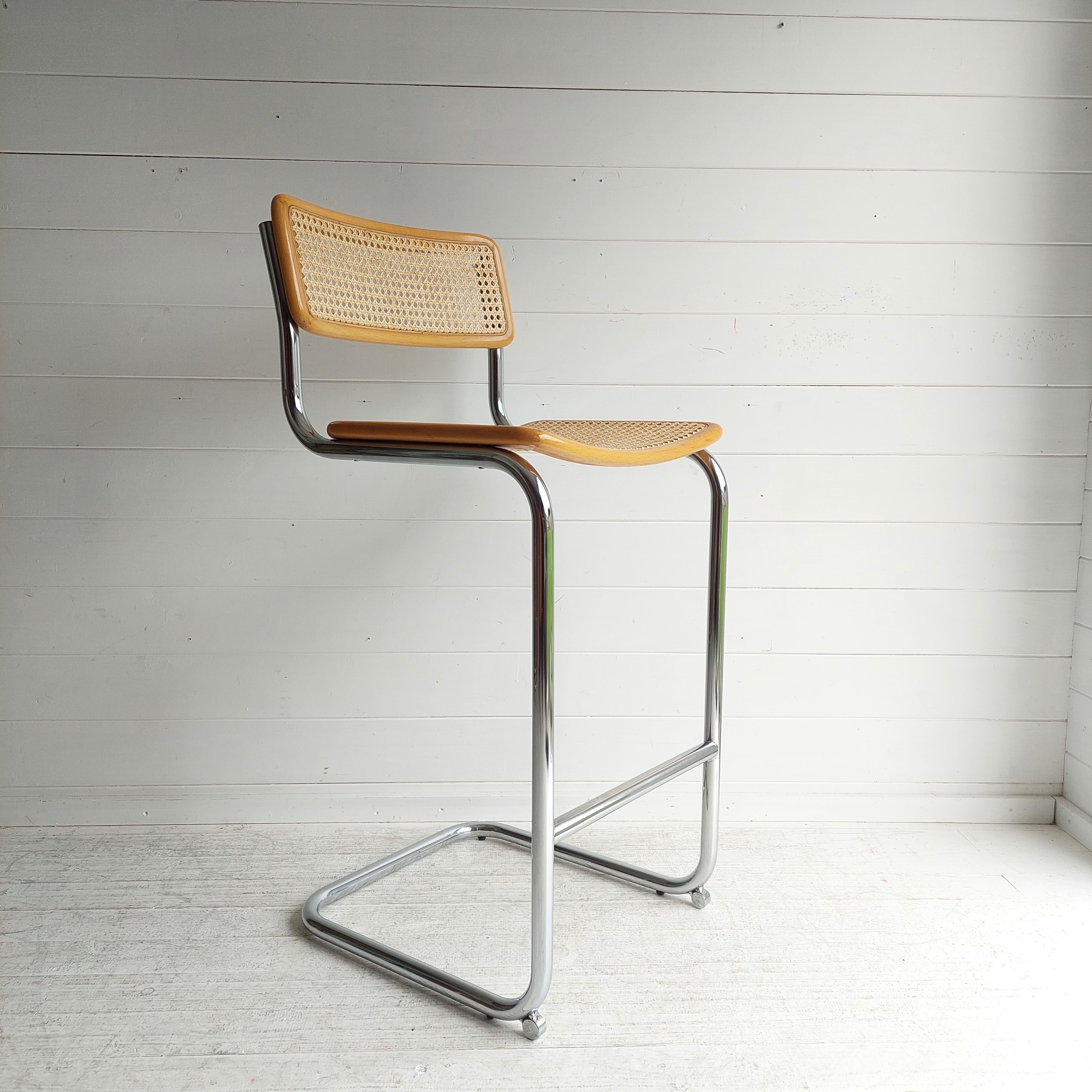 A stylish mid century Cesca bar stool originally designed by Marcel Breuer for Knoll International.
Model S32 made in Italy 70s

The Cesca was originally designed in 1928, after Breuer had perfected his personal style in the Bauhaus carpentry