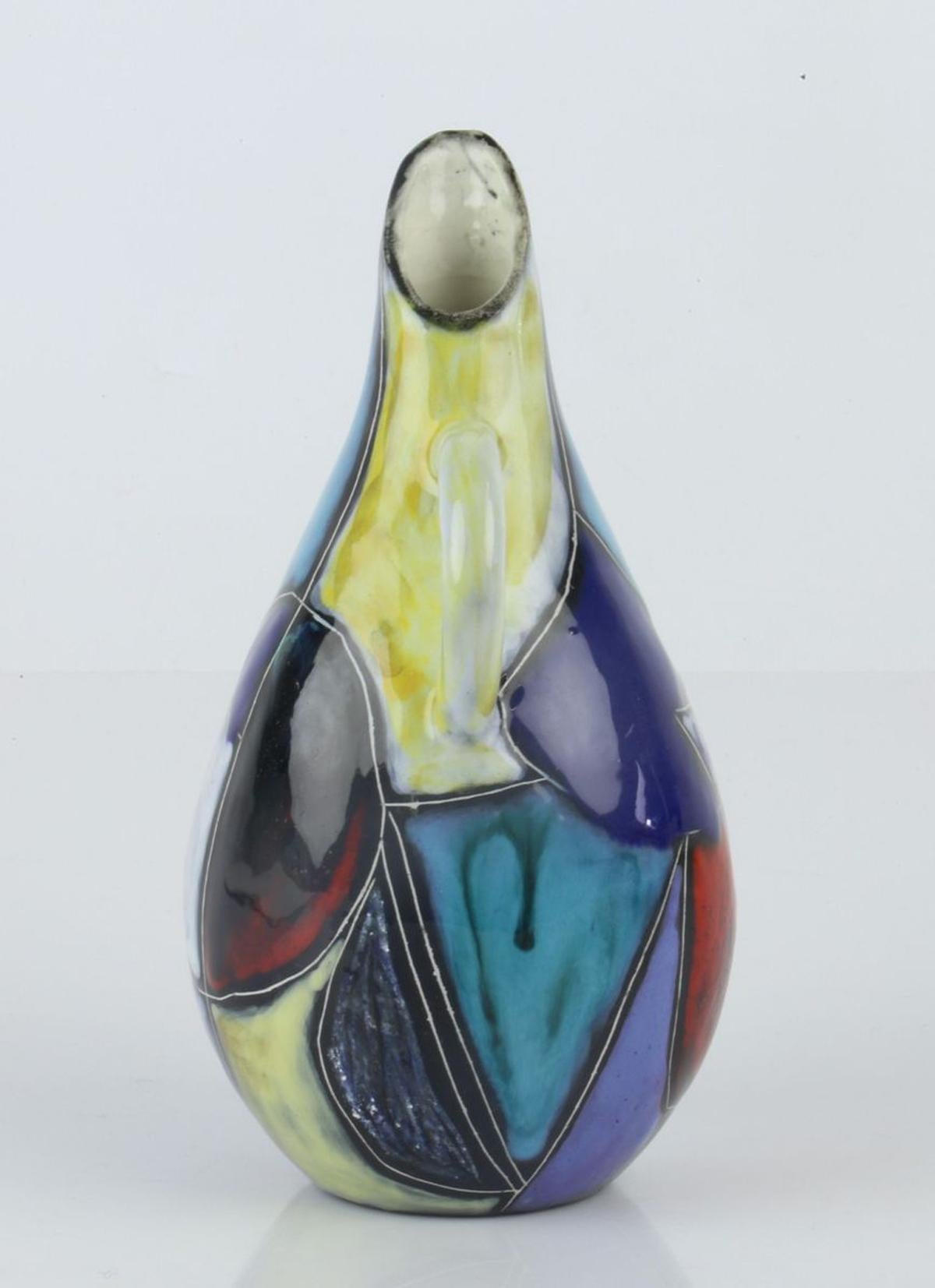 Small and beautiful Marcello Fantoni Studio vase with a handle, In typical Mid-Century style made with bold colors. Signed with his typical signature 