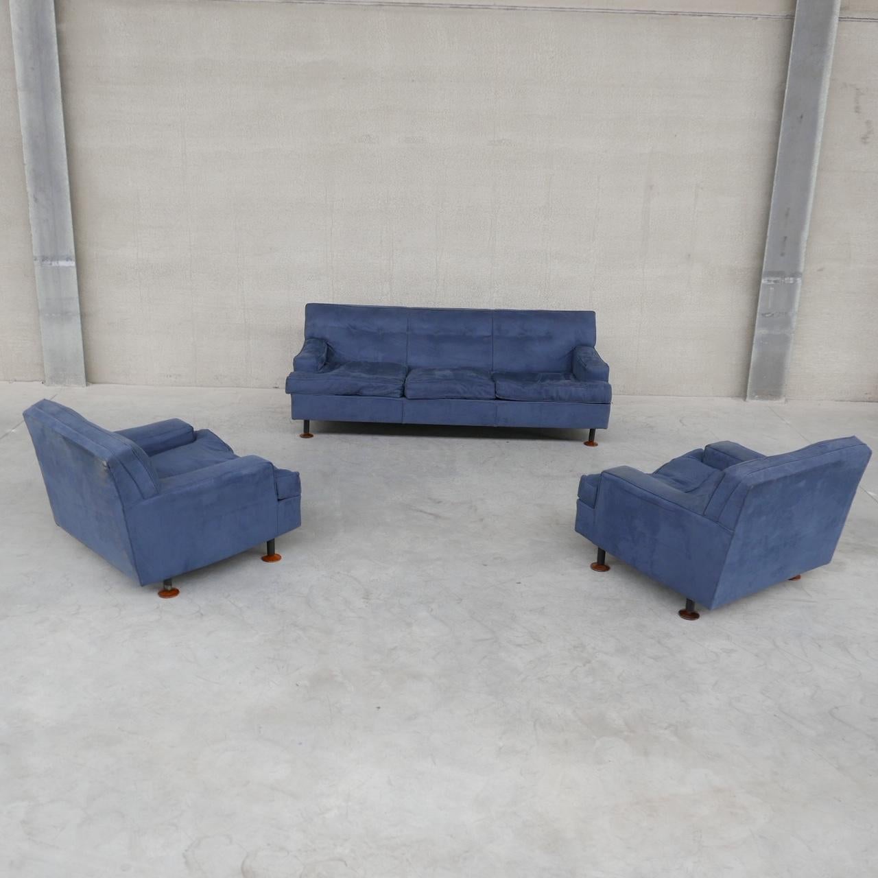 A pair of armchairs and three seater sofa. 

By Marco Zanuso for Arflex. 

Italy, c1962. 

Original upholstery wants updating, priced accordingly. 

Location: Belgium Gallery. 

Dimensions: Armchairs: 81 W x 80 D x 37 Seat Height x 66