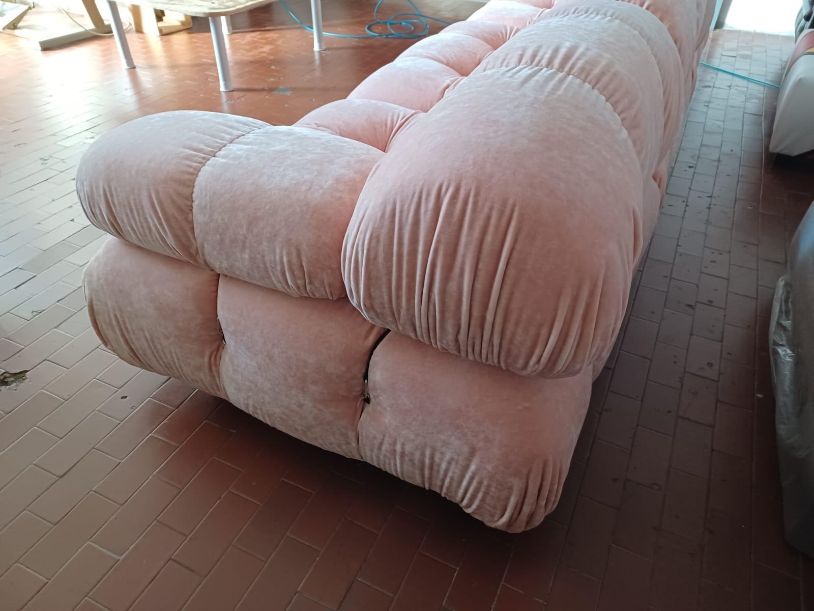  First  edition Mario Bellini Camaleonda modular sofa. Consists of three seats, all with backs and two arms. 

This is an original 1970s edition recovered in a beautiful Italian think pile peach/pink velvet. Each chair has a sticker which is signed