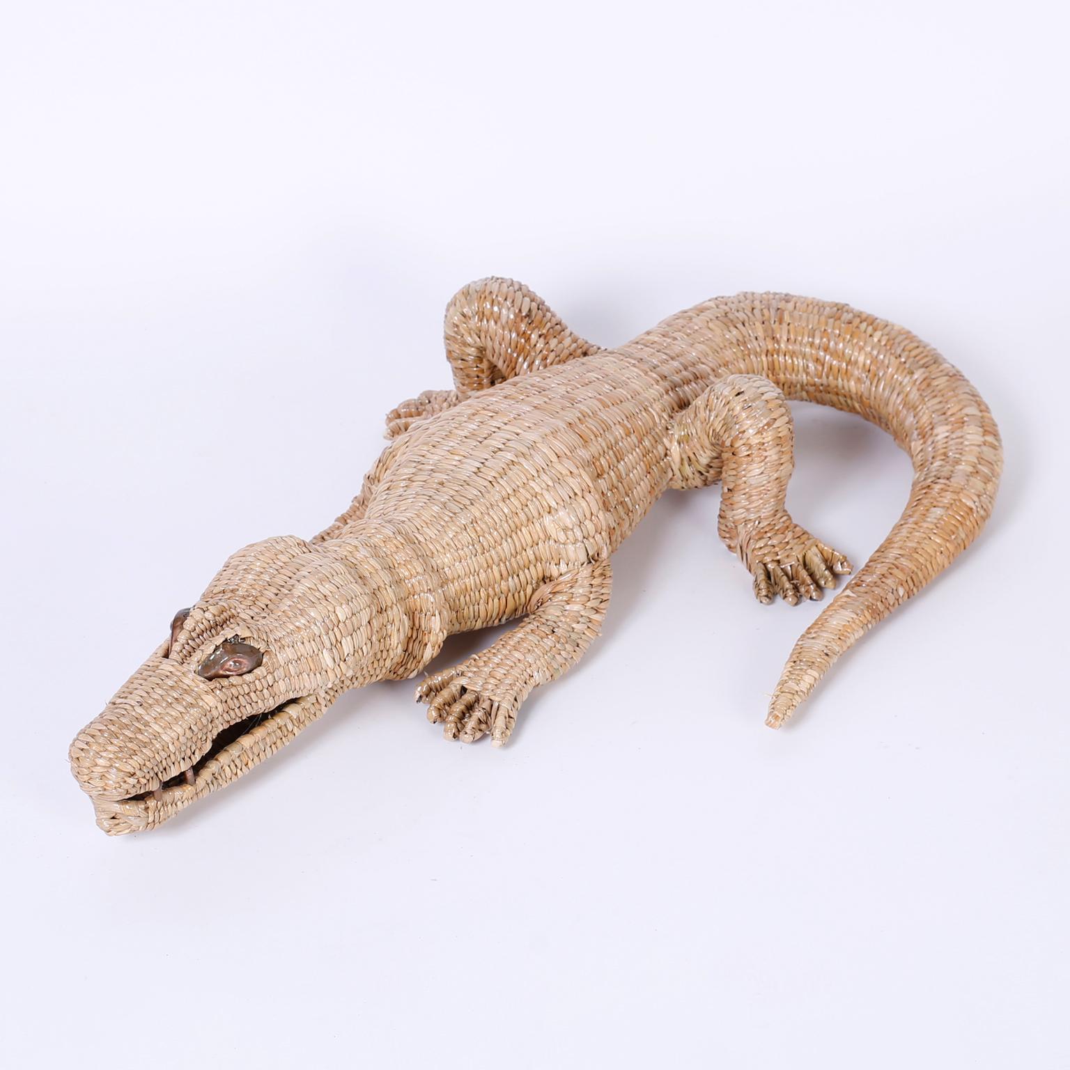Whimsical alligator sculpture crafted with wicker or reed woven over a metal frame, that captures the prehistoric spirit of the tropical creature in an amusing way, signed Mario Torres 1974 on a brass medallion.