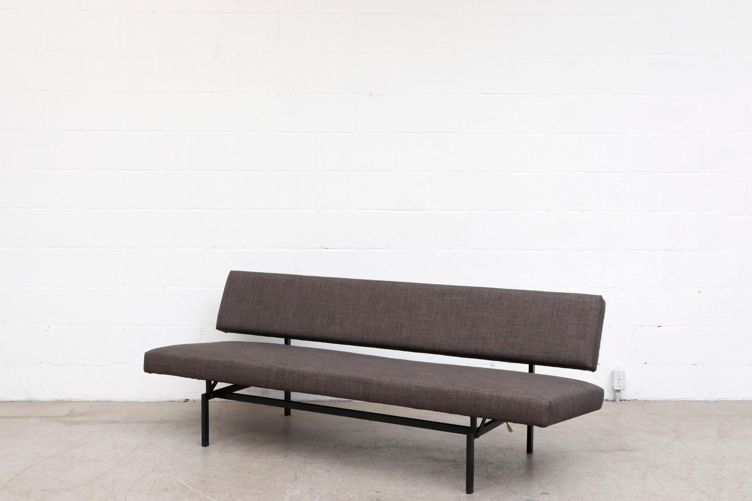 Midcentury Martin Visser sleeper sofa with charcoal grey upholstery and black enameled metal frame. In overall good condition with pull-out seat for sleeper. Other similar style sofas also available (LU922419801852). Shot with Willy van der Meeren
