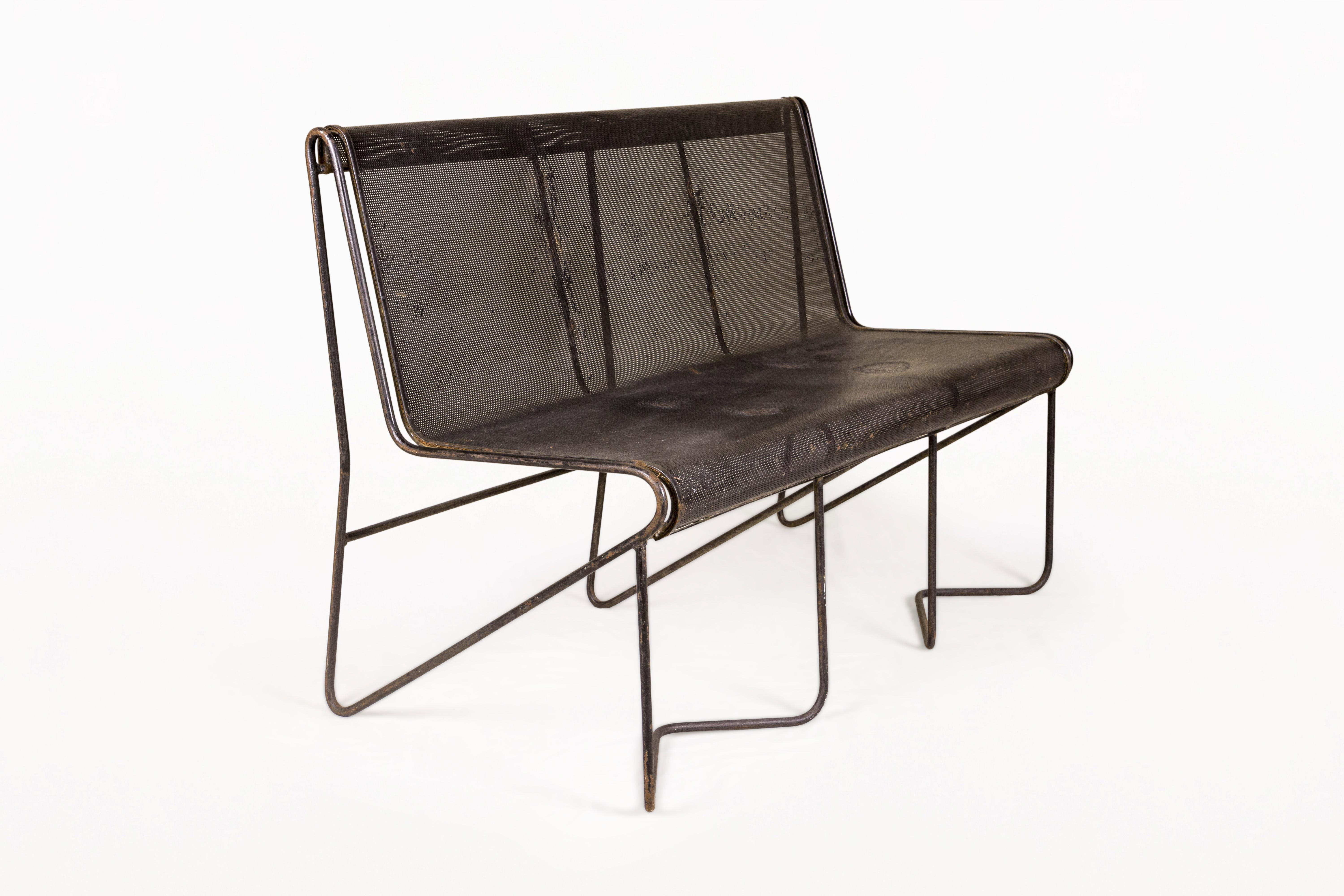 Mathieu Matégot bench.
Made with perforated iron.
Lacquered in black.
Circa 1950, France.
Very good vintage condition.
Mathieu Matégot (1910 - 2001) was a versatile, independent and self-taught Hungarian designer, architect and artist who spent most