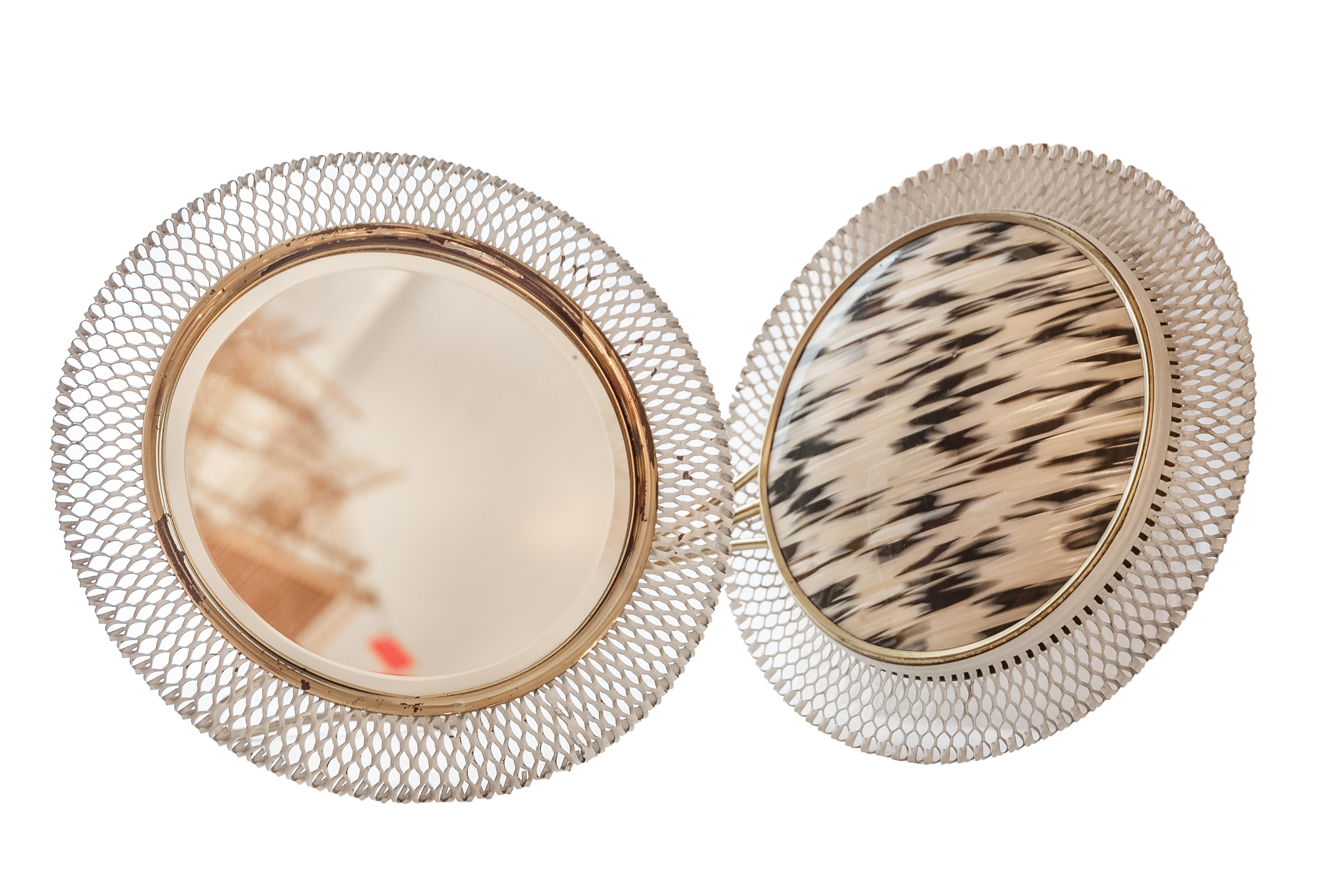 Mid-century Mathieu Matégot metal and Acrylic Mother Pearl Vanity Mirrors, 1950.

Superb Mid-Century Modern French vanity mirrors with brass and perforated metal mesh frame. Sttylish Mathieu Matégot, France circa 1950s. Excellent original condition,